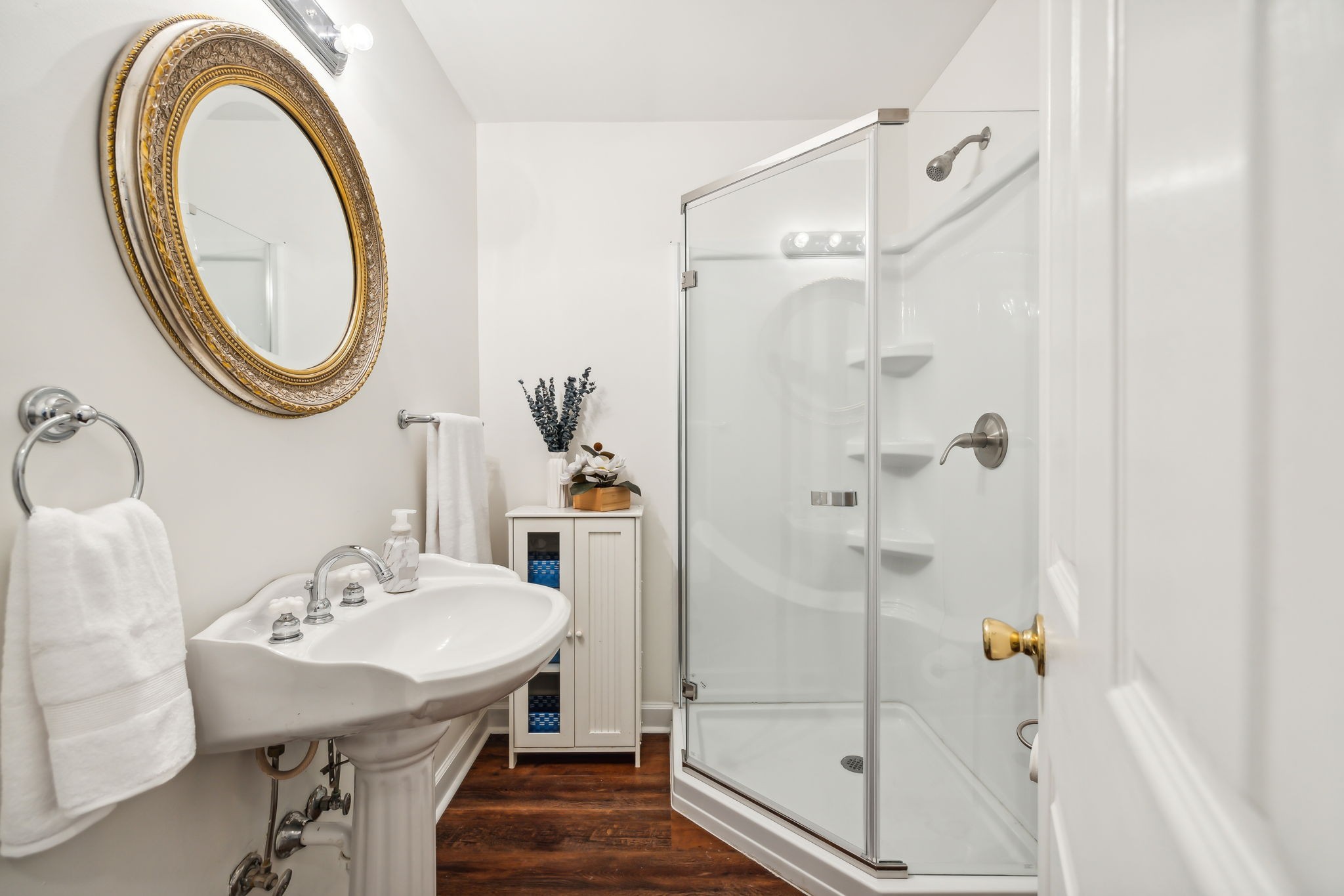 1712 Sugar Ridge Road Spring Hill, TN 37174 - Photo 35 of 65 a bathroom with a sink a mirror a vanity and a shower