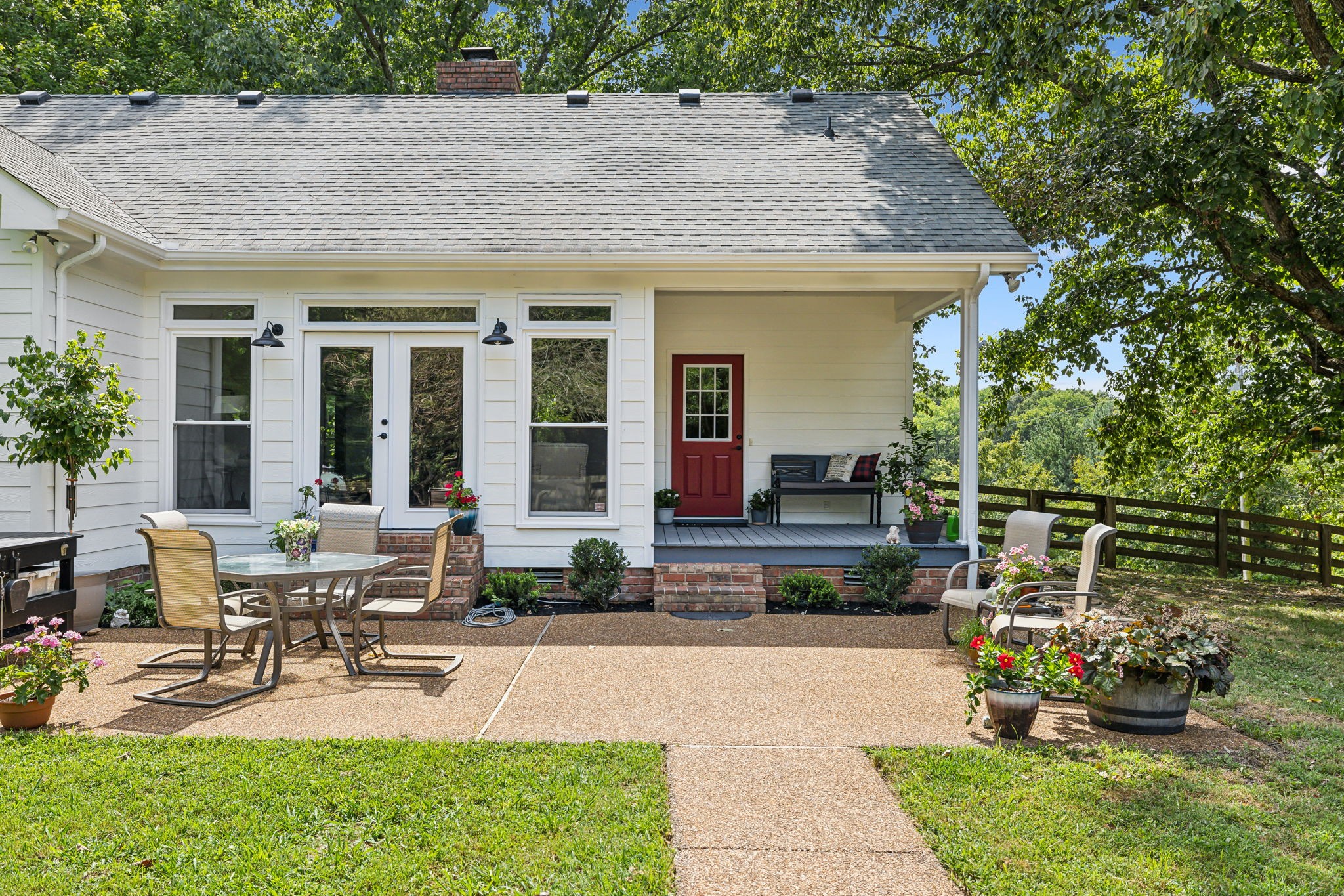 1712 Sugar Ridge Road Spring Hill, TN 37174 - Photo 42 of 65 a view of a house with backyard sitting area and garden