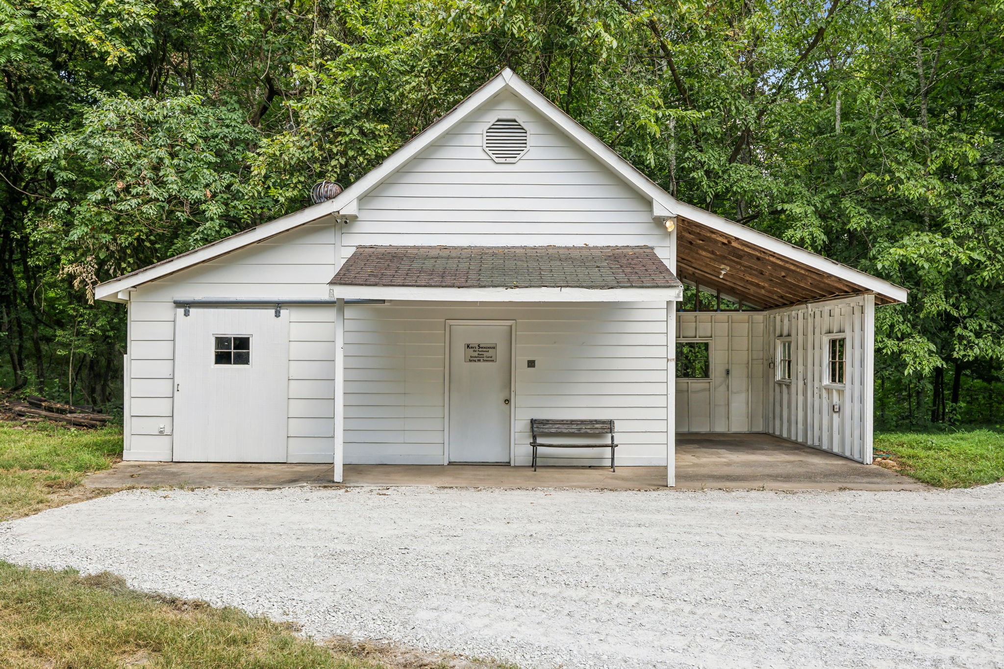 1712 Sugar Ridge Road Spring Hill, TN 37174 - Photo 50 of 65 a view of a house with a yard and garage