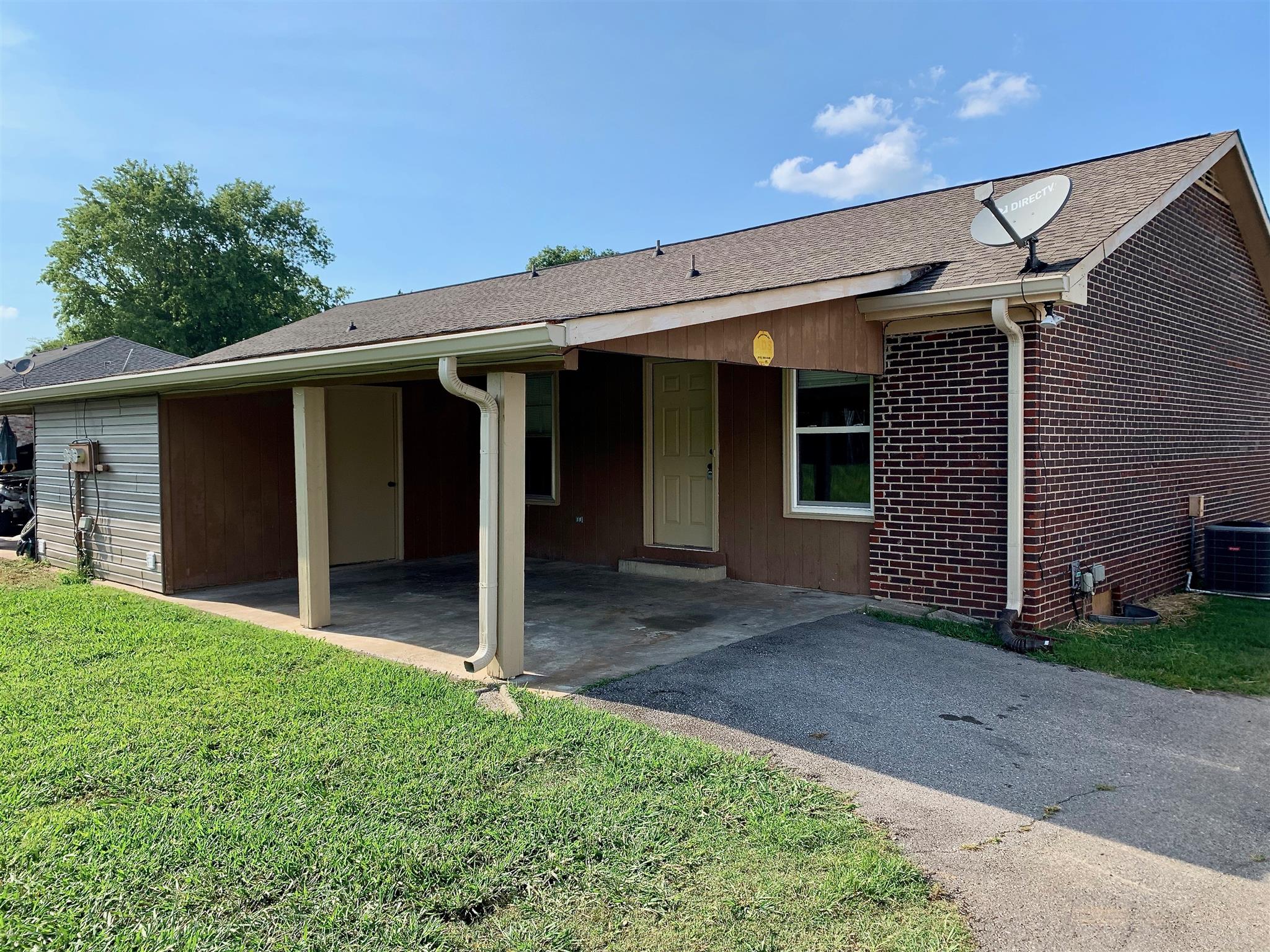 1163 Lawrence Road Murfreesboro, TN 37128 - Photo 2 of 12 Covered patio and storage shed with paved driveway! 1163 Lawrence Rd Murfreesboro TN 37128