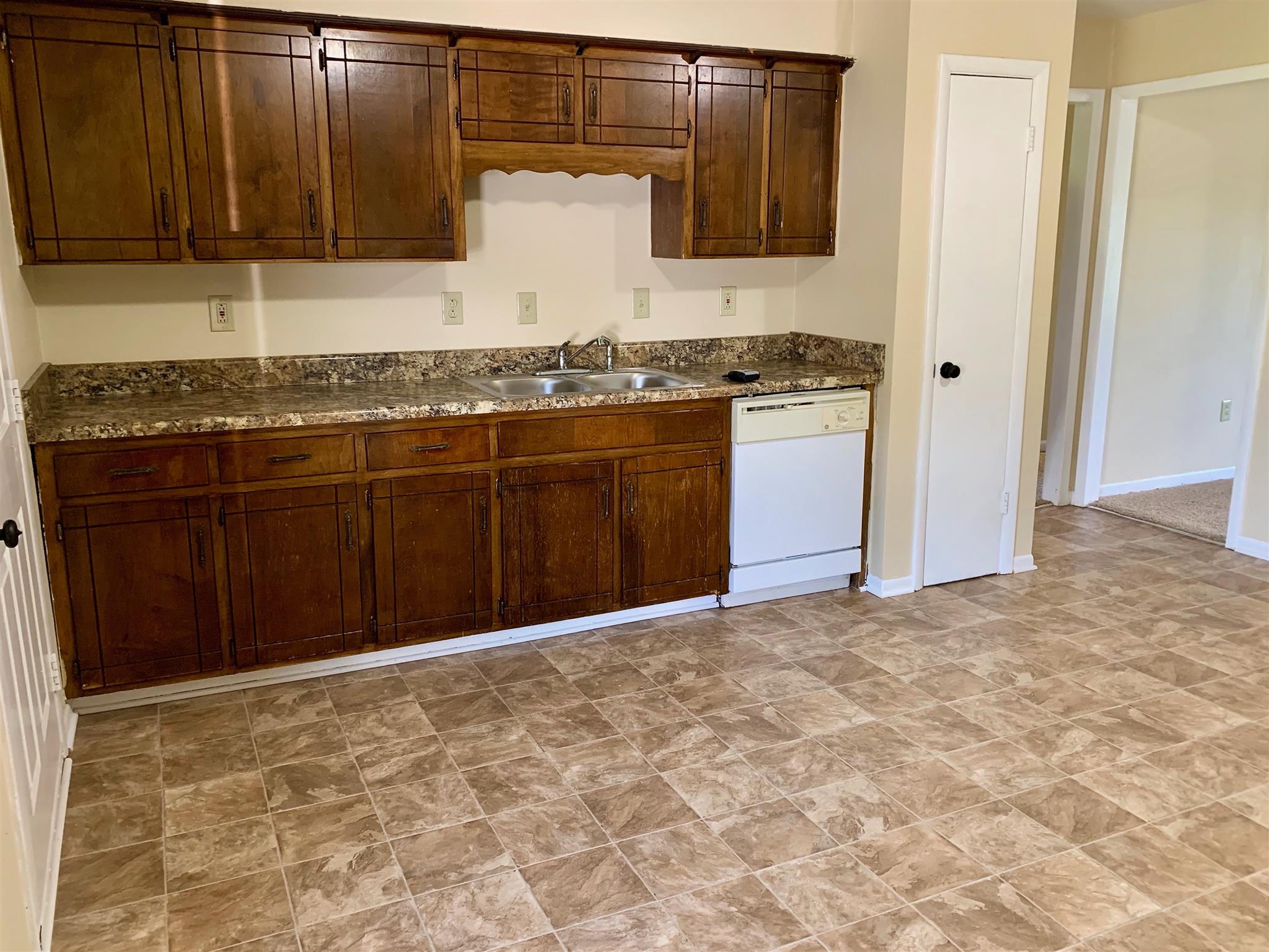 1163 Lawrence Road Murfreesboro, TN 37128 - Photo 4 of 12 Kitchen has double sink and pantry! Tons of cabinet and counter space! 1163 Lawrence Rd Murfreesboro TN 37128