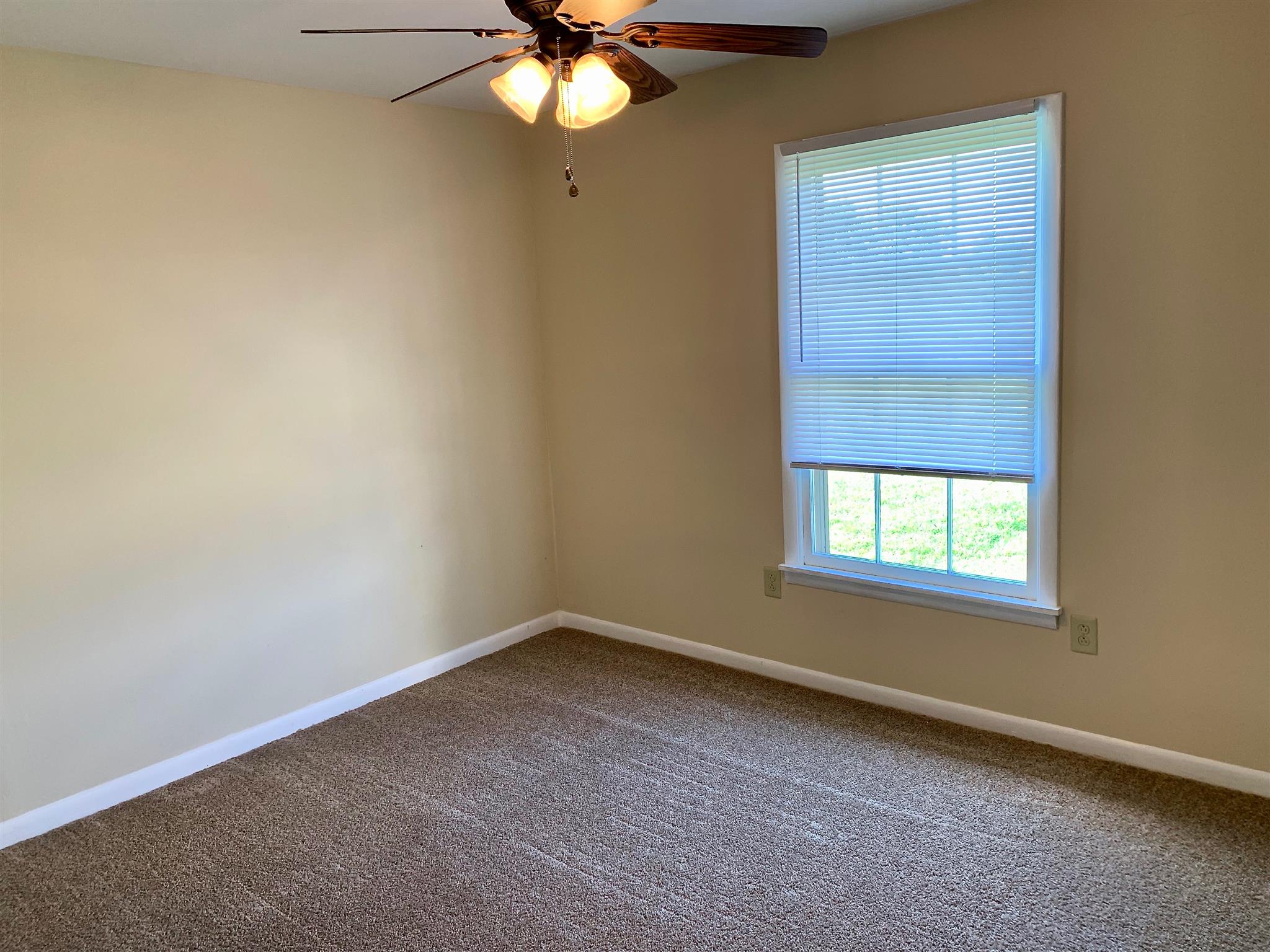 1163 Lawrence Road Murfreesboro, TN 37128 - Photo 7 of 12 First bedroom freshly painted with neutral paint! 1163 Lawrence Rd Murfreesboro TN 37128