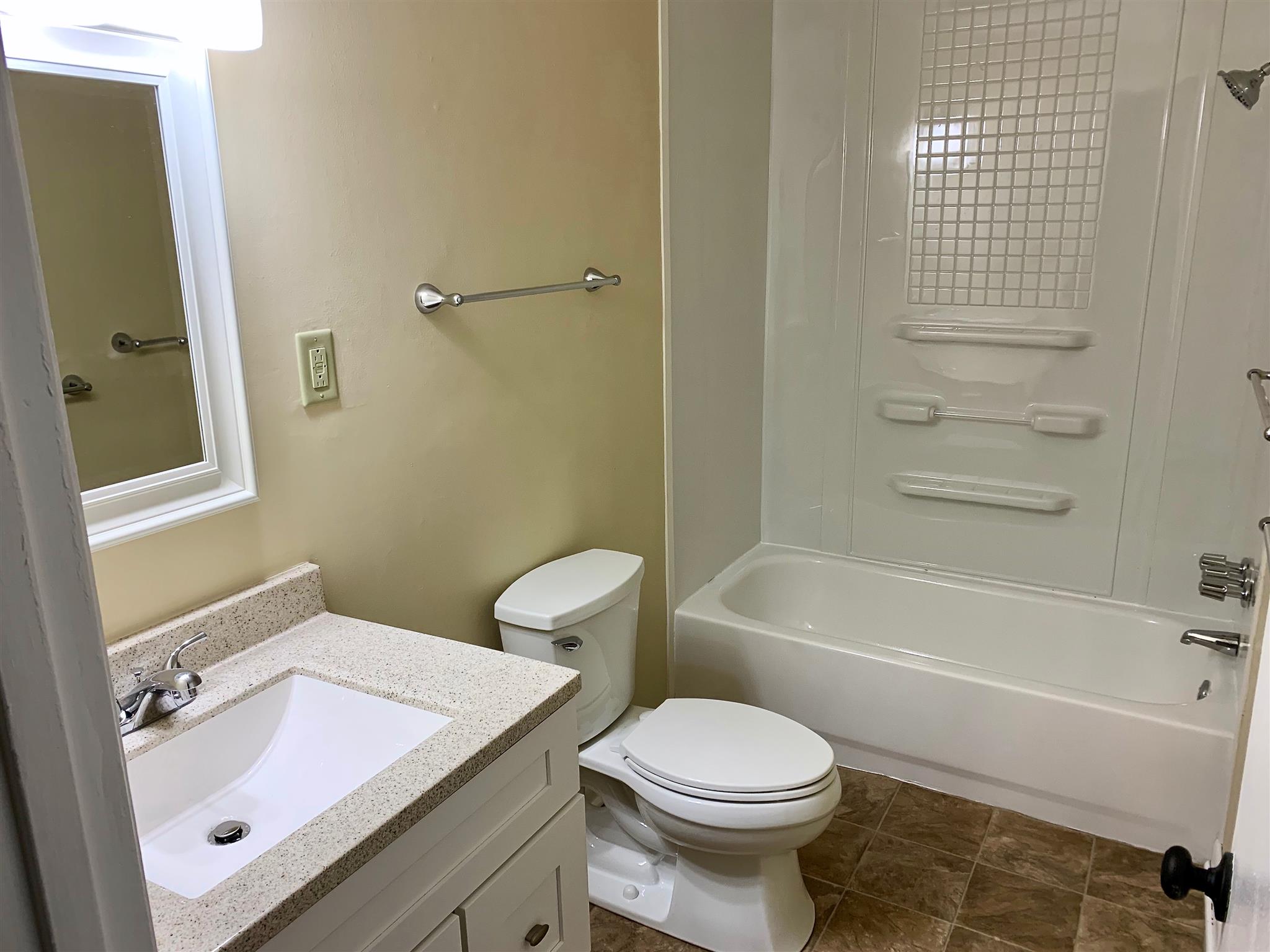 1163 Lawrence Road Murfreesboro, TN 37128 - Photo 9 of 12 Completely remodeled bathroom! New tub surround and toilet! 1163 Lawrence Rd Murfreesboro TN 37128