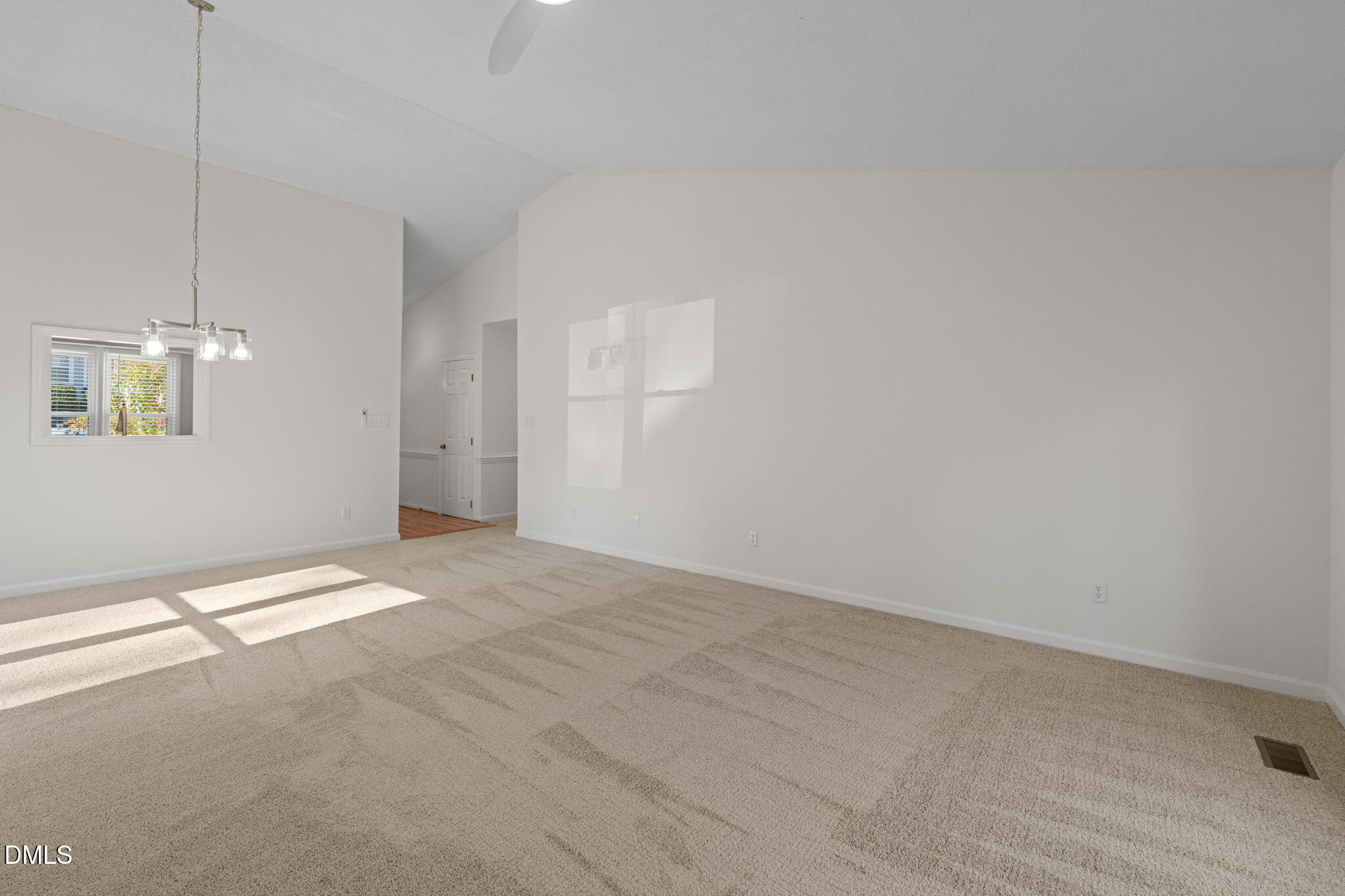 1424 Mapleside Court Raleigh, NC 27609 - Photo 13 of 72 a view of an empty room with a window