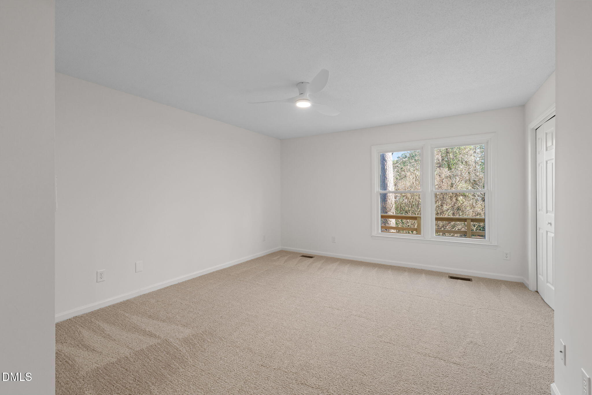 1424 Mapleside Court Raleigh, NC 27609 - Photo 22 of 72 an empty room with a window