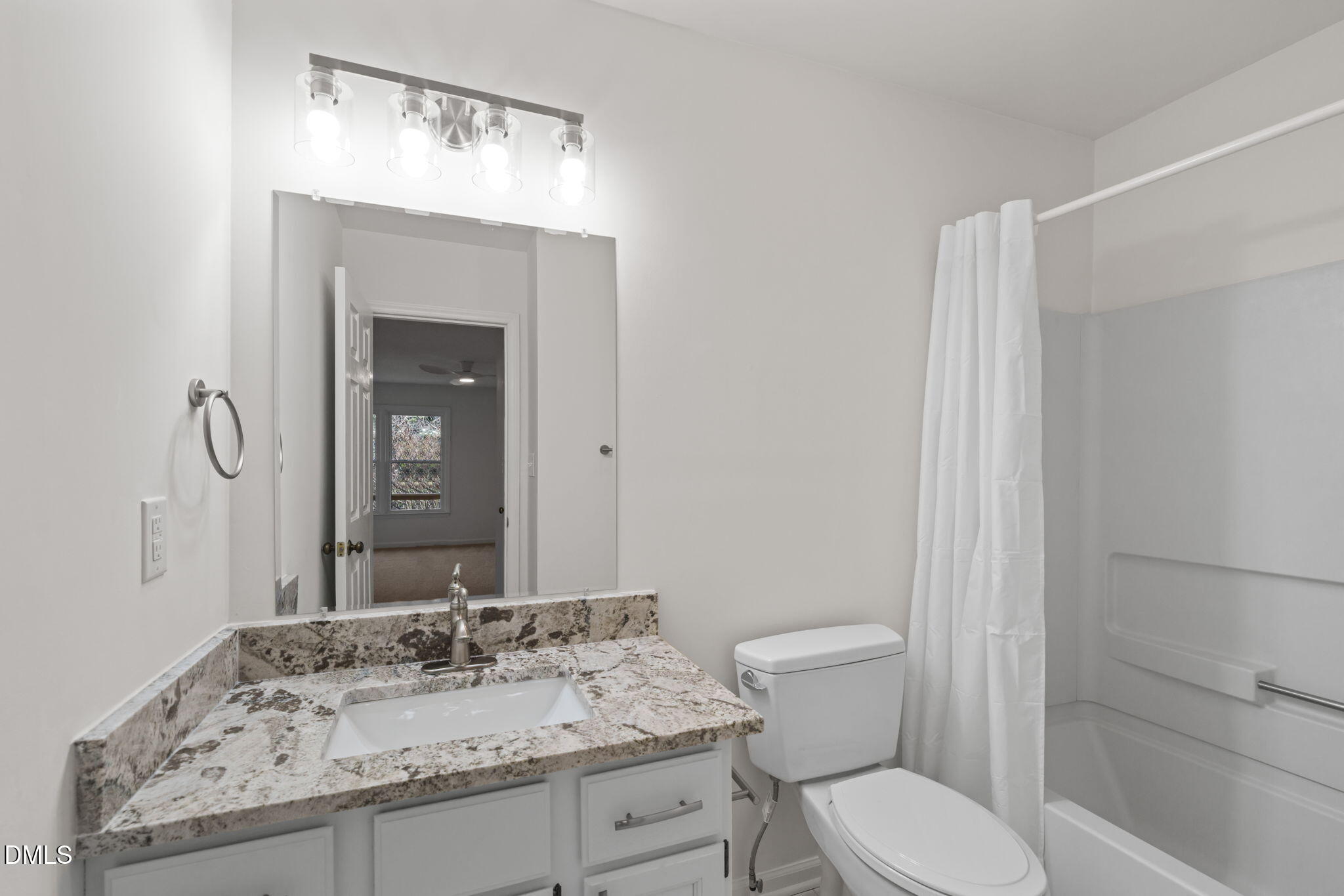 1424 Mapleside Court Raleigh, NC 27609 - Photo 24 of 72 a bathroom with a sink and a toilet