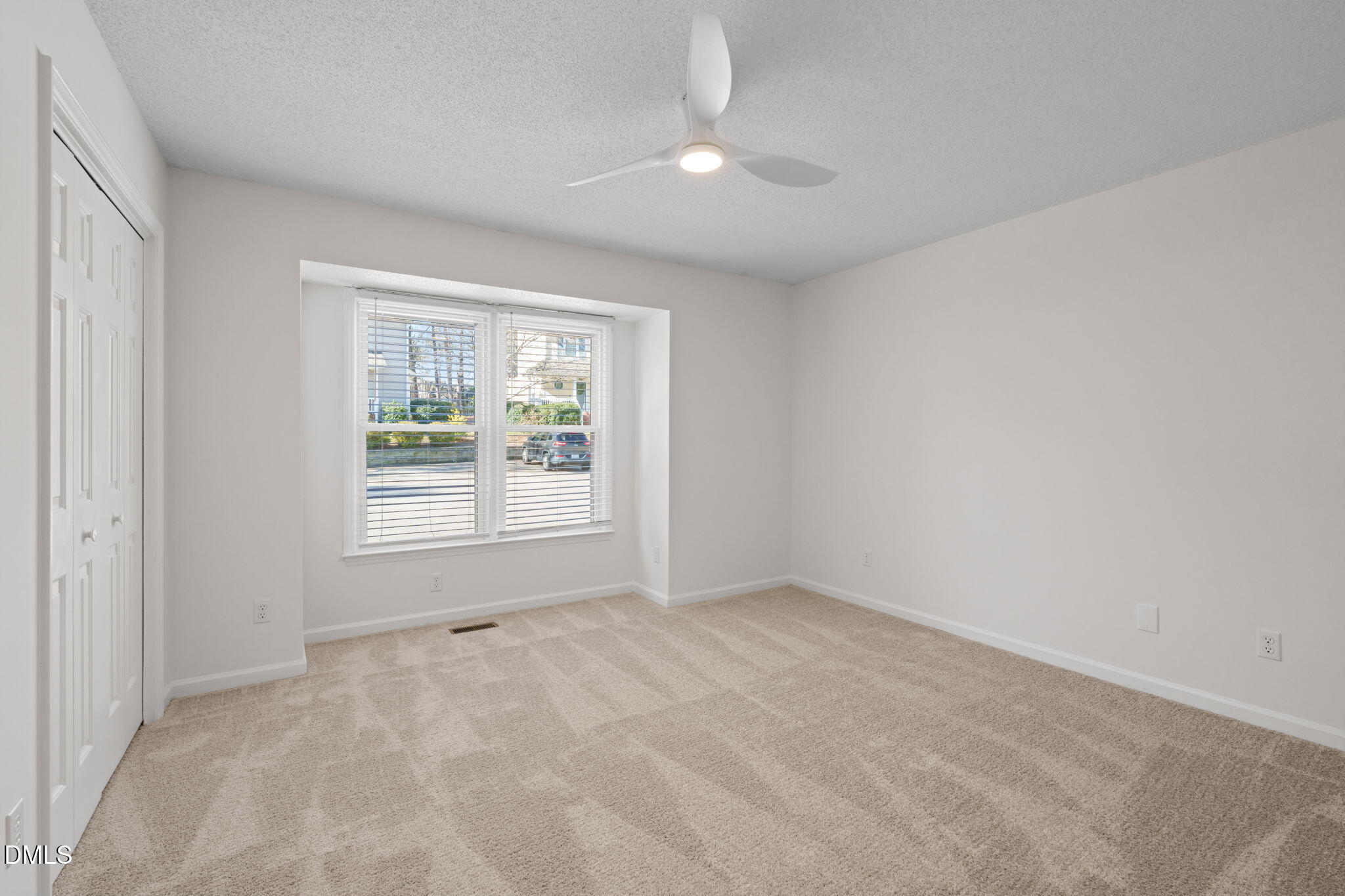 1424 Mapleside Court Raleigh, NC 27609 - Photo 26 of 72 a view of an empty room with a window