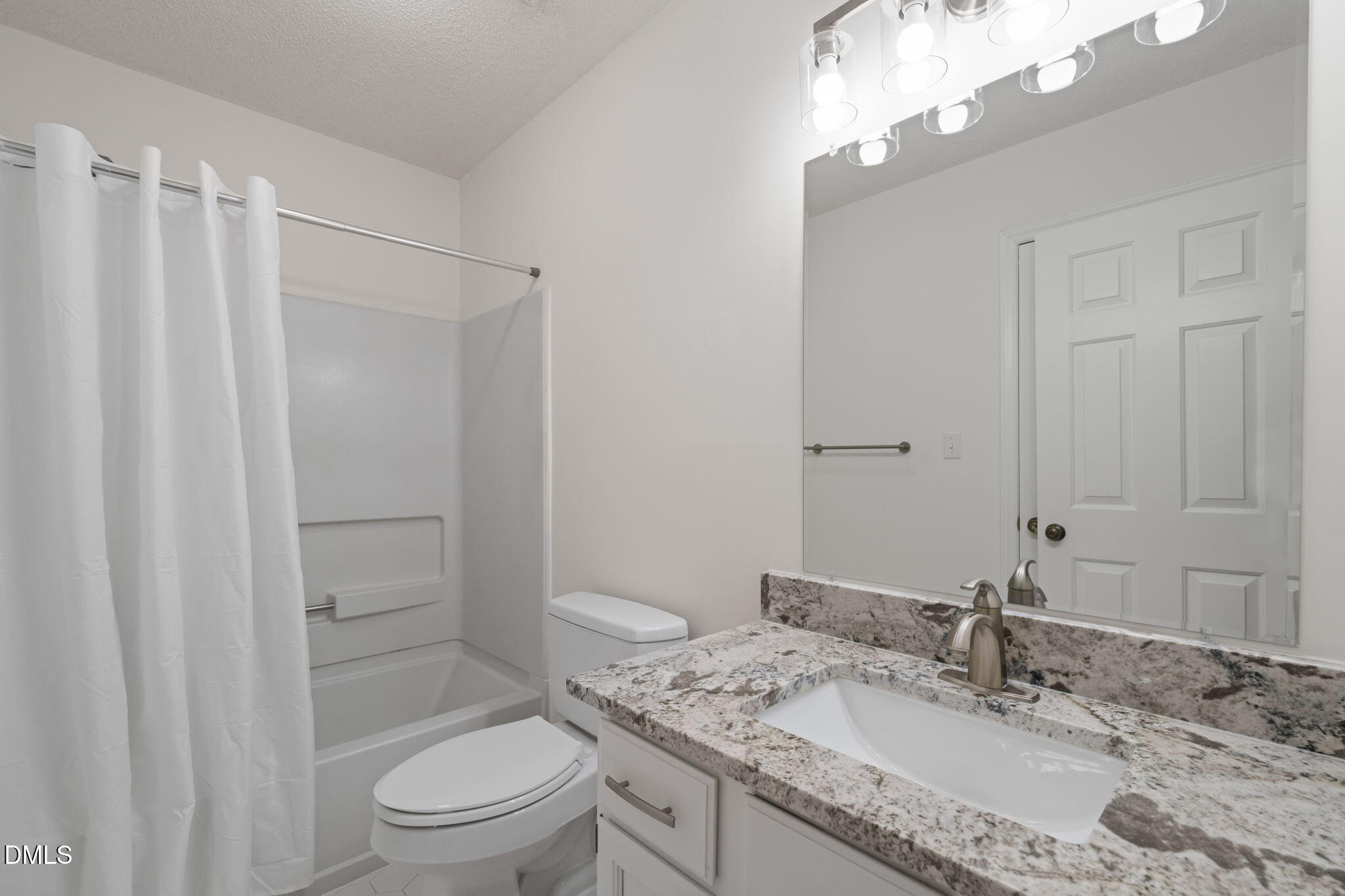 1424 Mapleside Court Raleigh, NC 27609 - Photo 28 of 72 a bathroom with a granite countertop sink toilet and shower