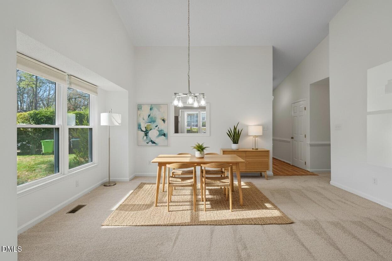 1424 Mapleside Court Raleigh, NC 27609 - Photo 3 of 72 a view of a dining room with furniture window and outside view