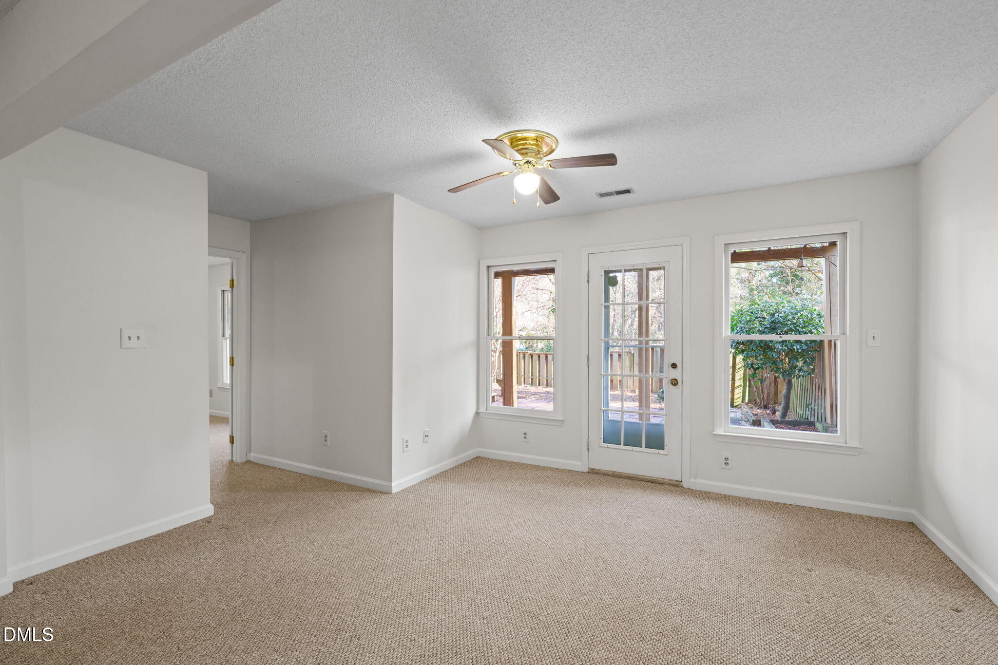 1424 Mapleside Court Raleigh, NC 27609 - Photo 38 of 72 a view of an empty room with a window