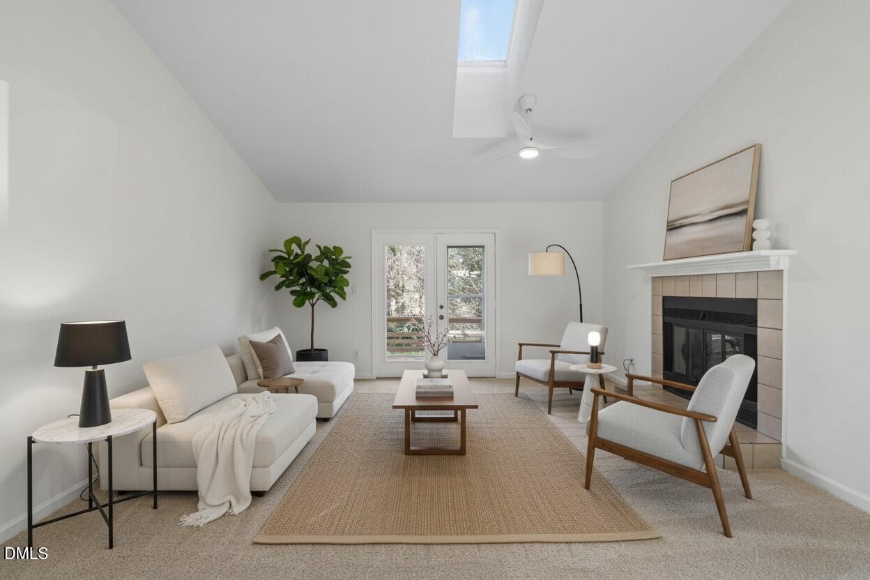 1424 Mapleside Court Raleigh, NC 27609 - Photo 4 of 72 a living room with furniture and a fireplace