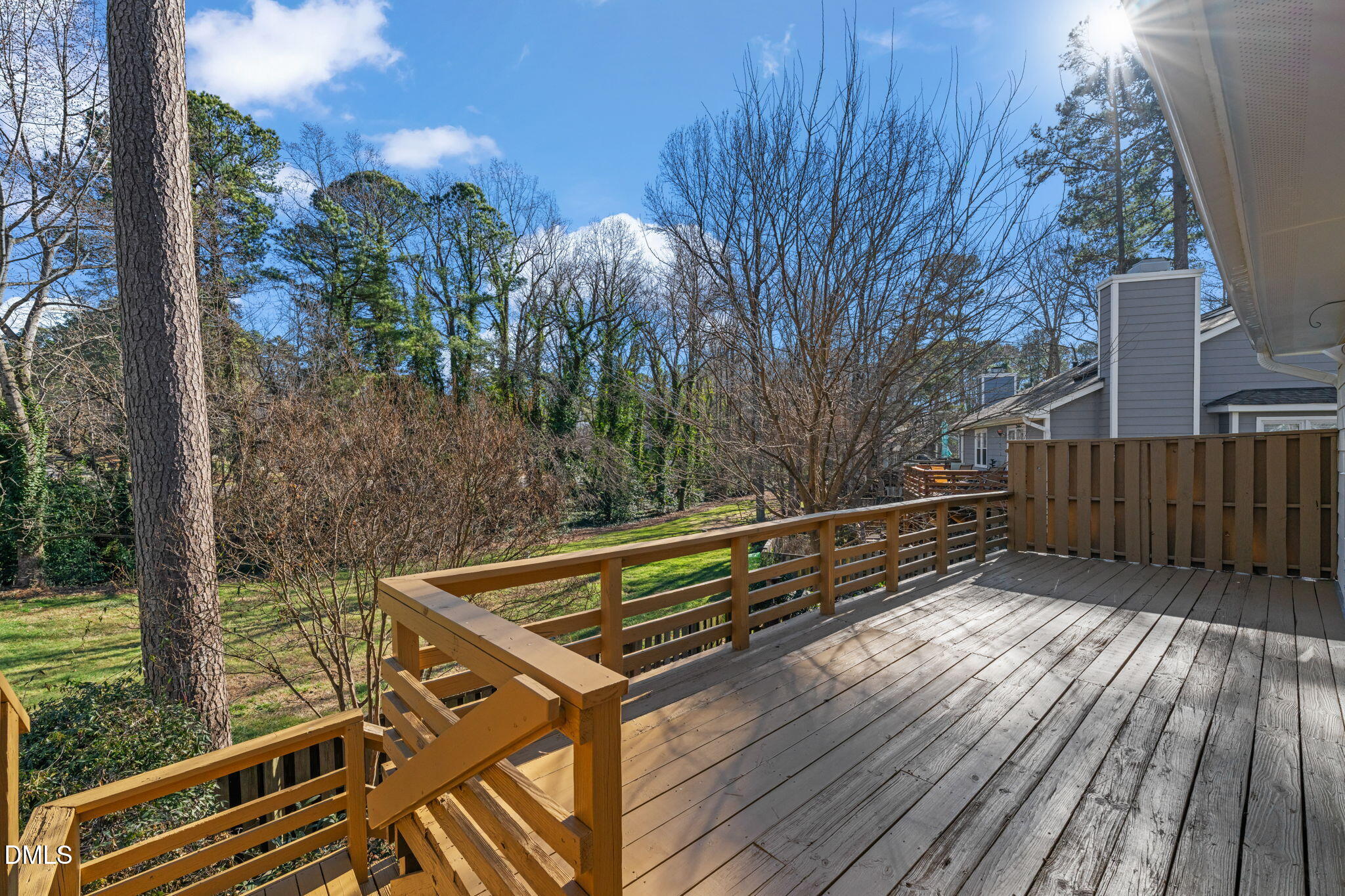 1424 Mapleside Court Raleigh, NC 27609 - Photo 41 of 72 a view of balcony with wooden floor and fence