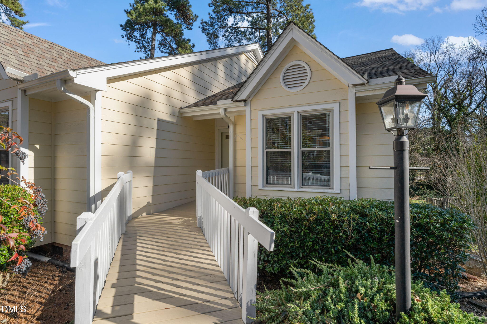 1424 Mapleside Court Raleigh, NC 27609 - Photo 44 of 72 a front view of a house with a garden