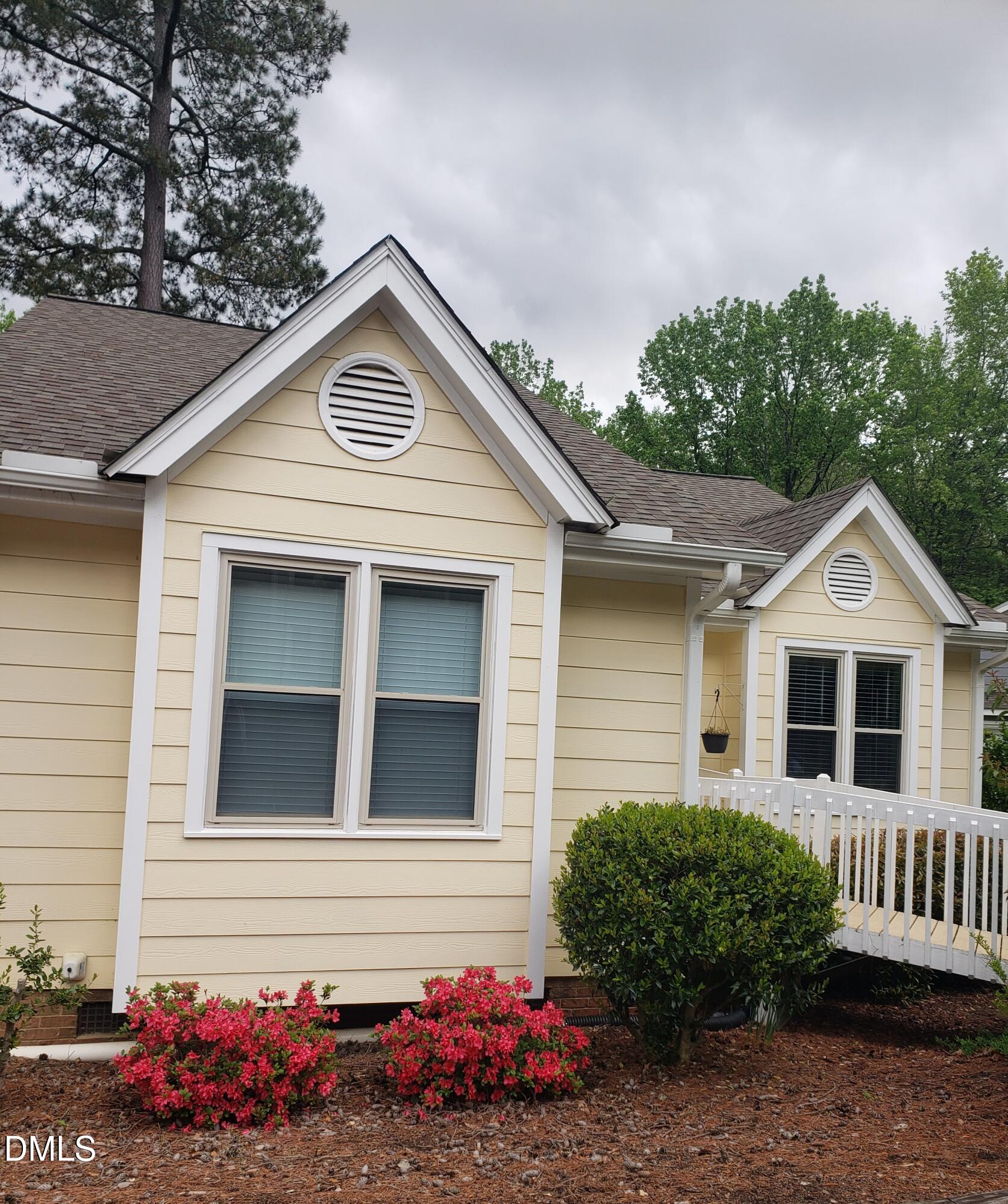 1424 Mapleside Court Raleigh, NC 27609 - Photo 60 of 72 a front view of a house with a yard