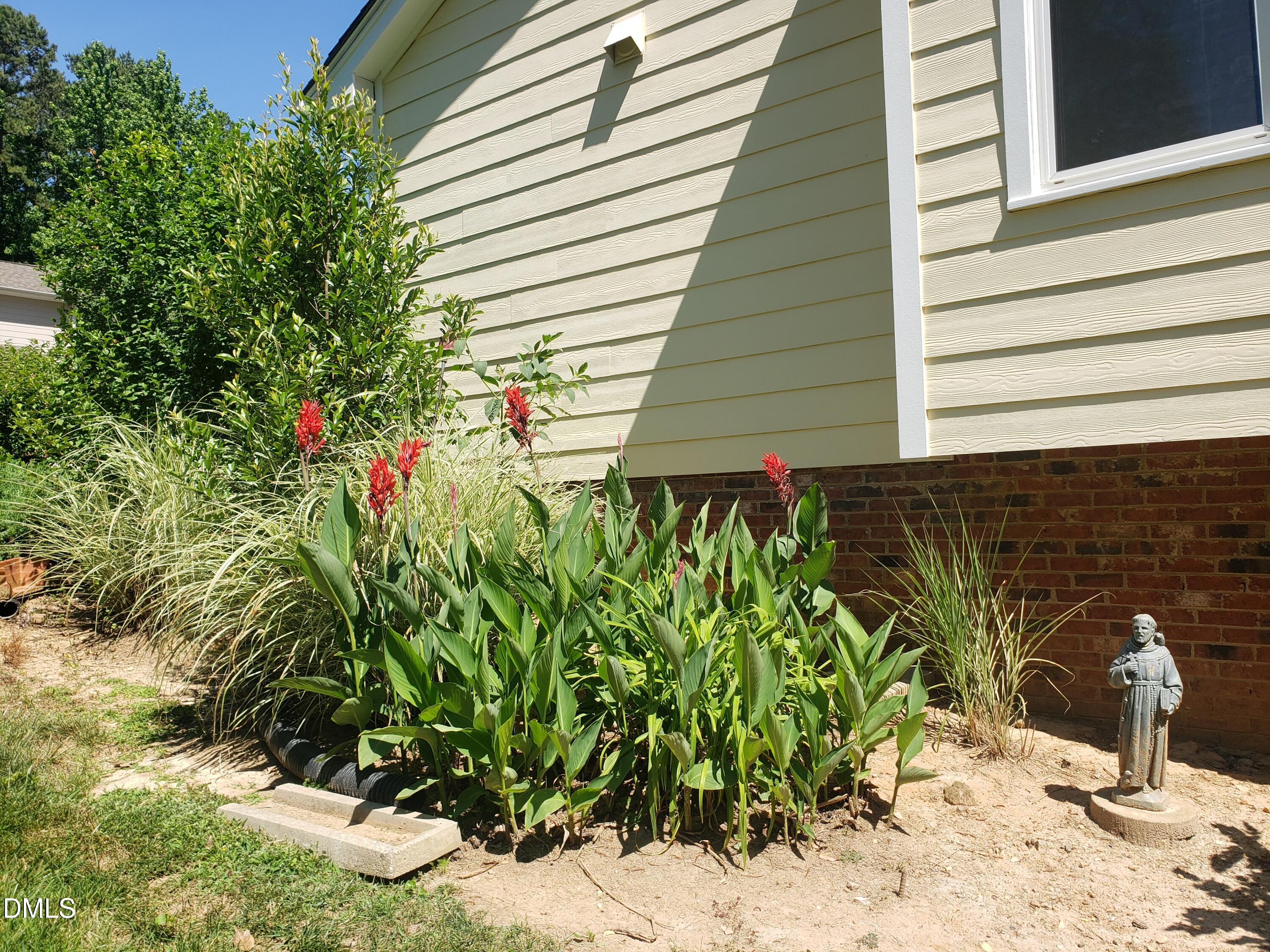 1424 Mapleside Court Raleigh, NC 27609 - Photo 62 of 72 a bathroom with a sink and mirror