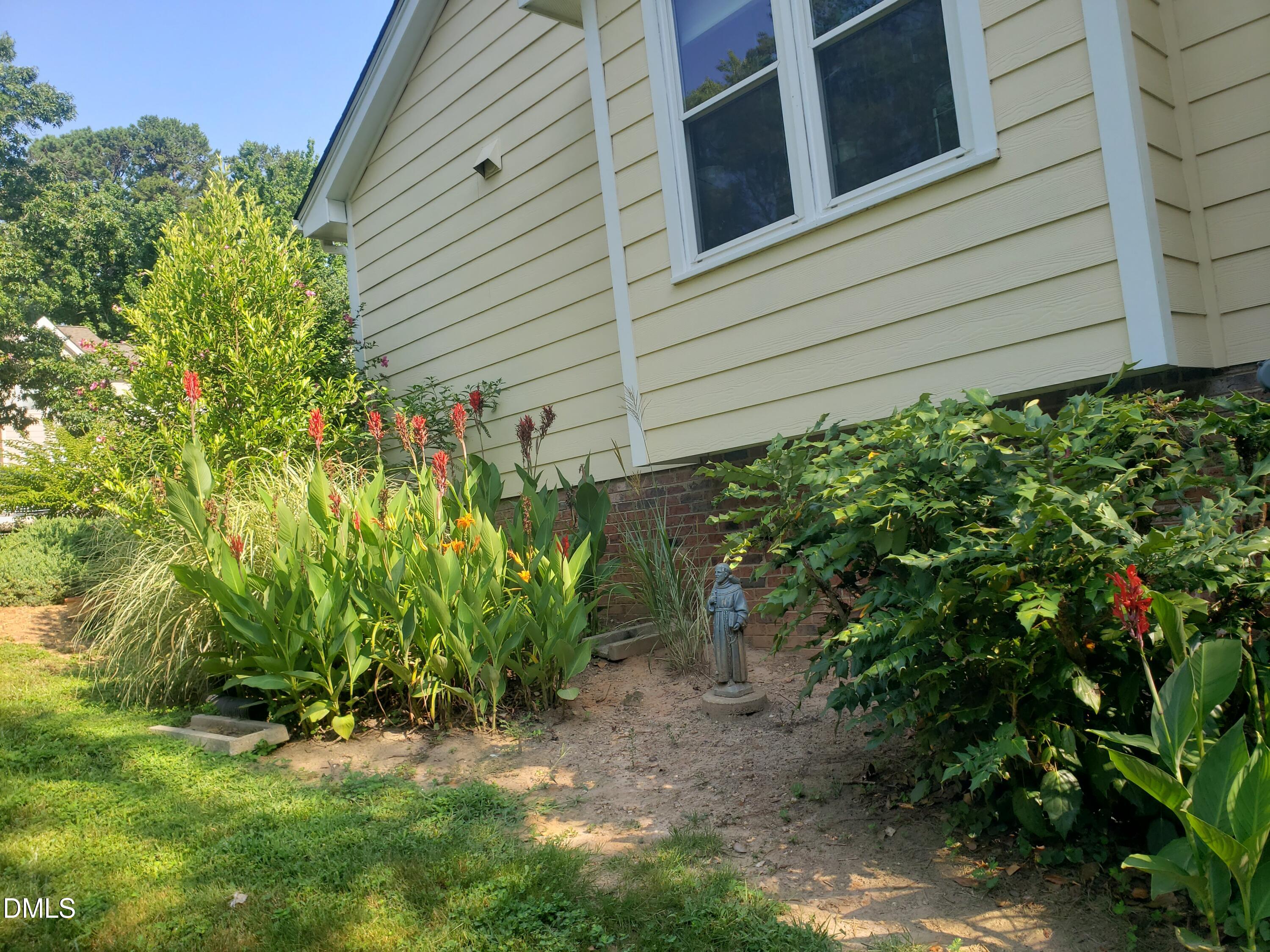 1424 Mapleside Court Raleigh, NC 27609 - Photo 69 of 72 a view of a house with a yard