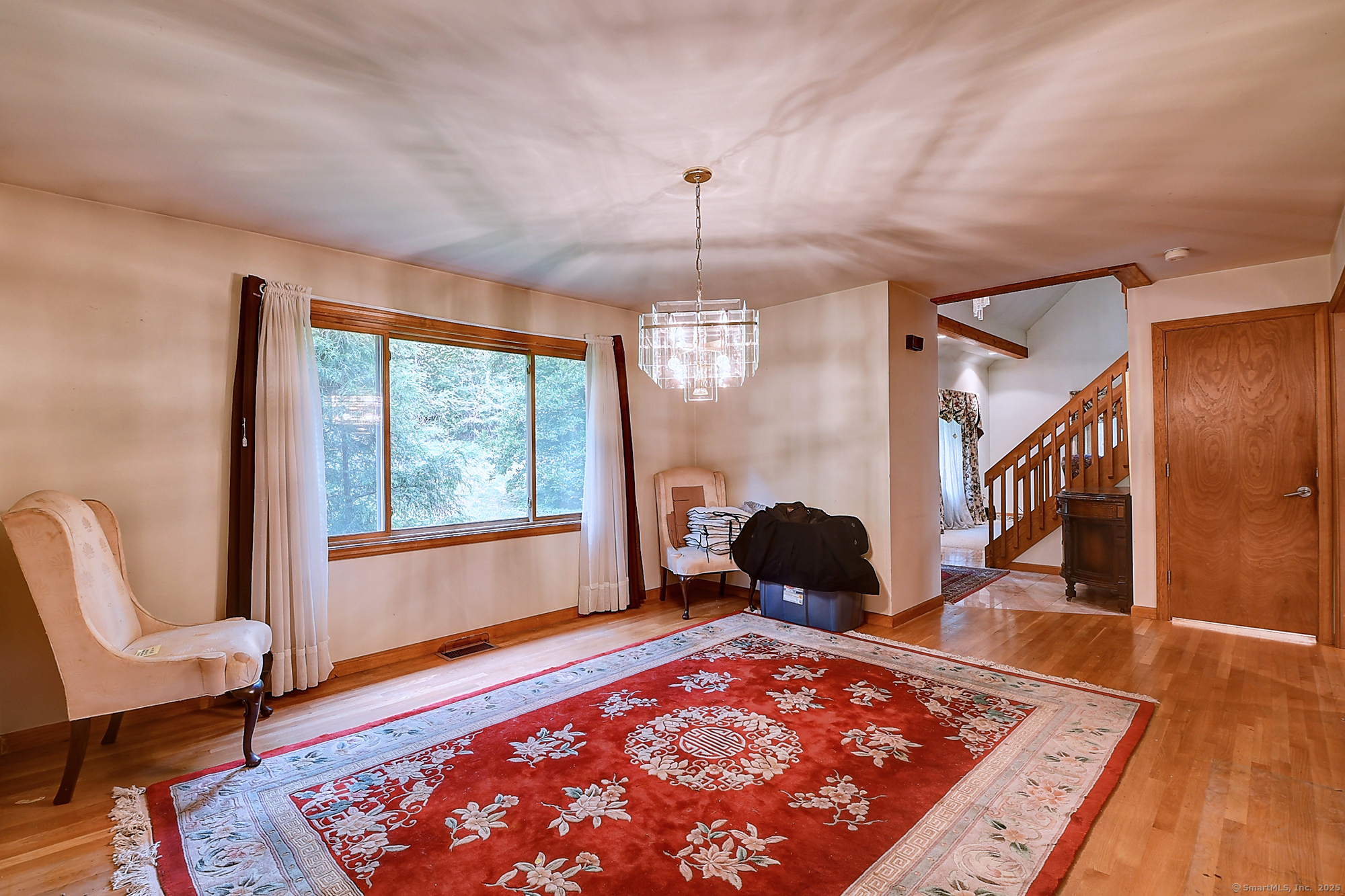 35 Weekeepeemee Road Bethlehem, CT 06751 - Photo 11 of 40 a living room with a rug