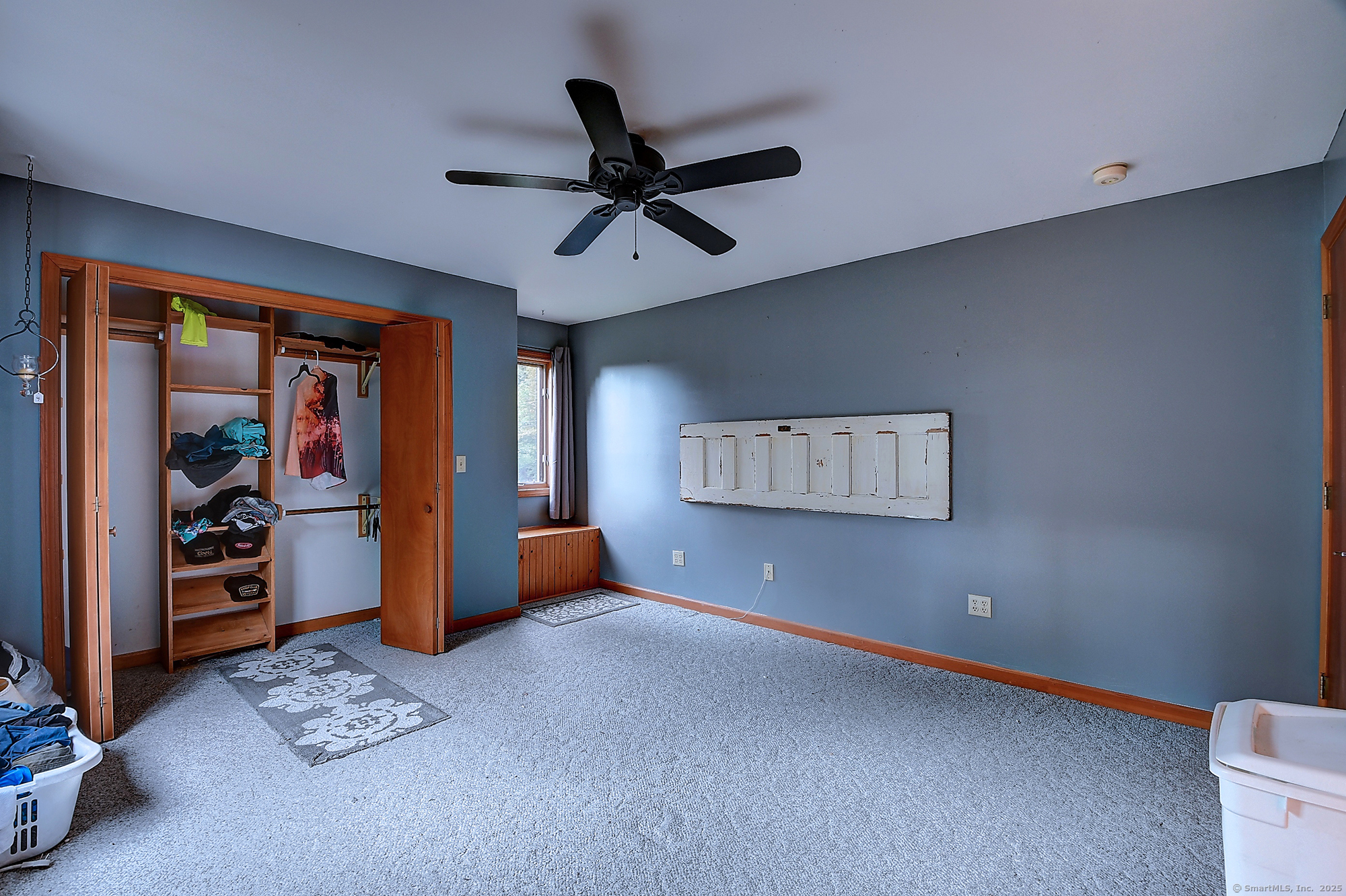35 Weekeepeemee Road Bethlehem, CT 06751 - Photo 19 of 40 a living room with furniture and a ceiling fan