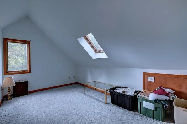 a room with furniture and a window