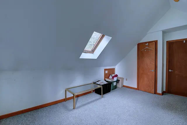 a view of room with air conditioner vent and window