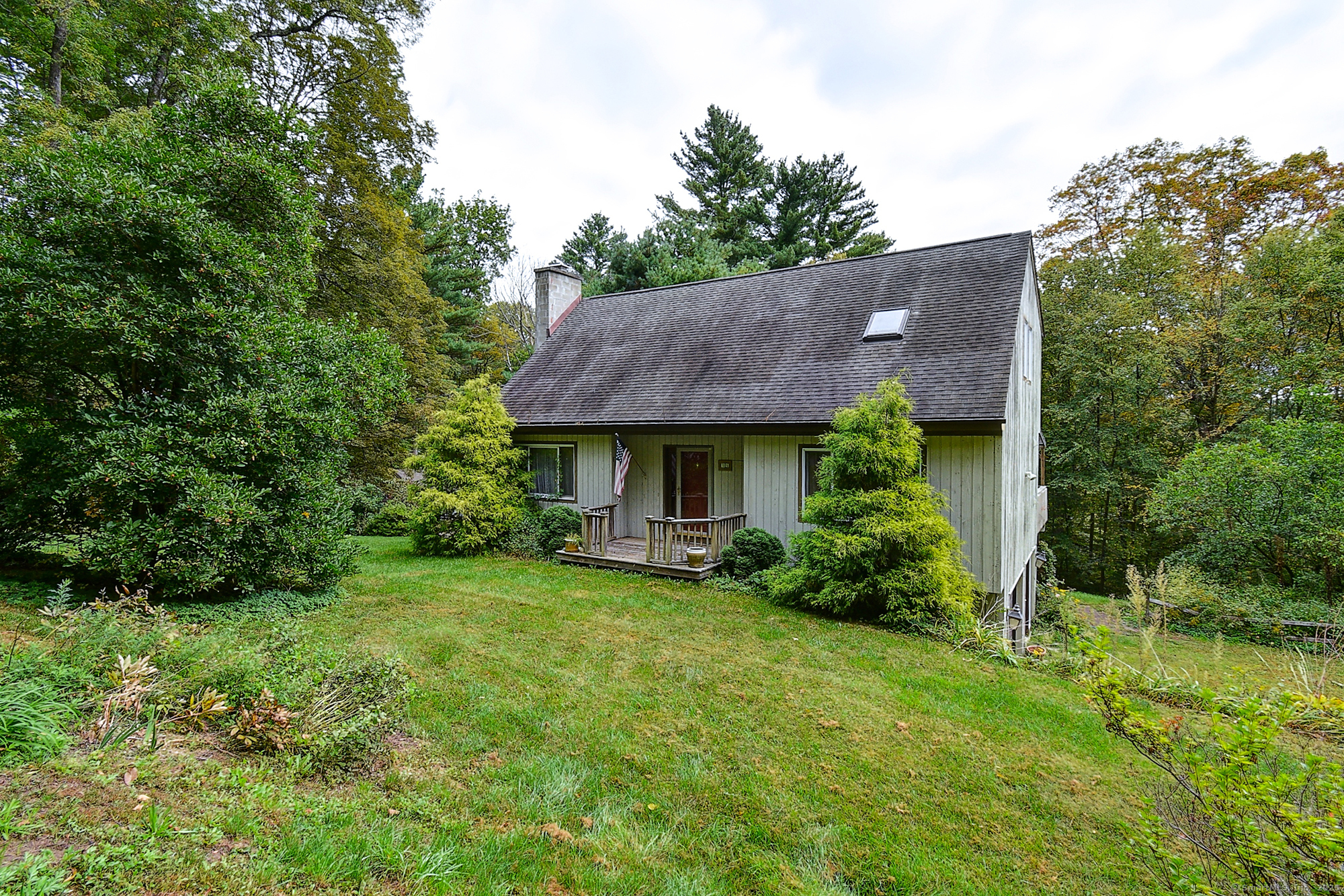 35 Weekeepeemee Road Bethlehem, CT 06751 - Photo 32 of 40 a view of a house with a yard and sitting area