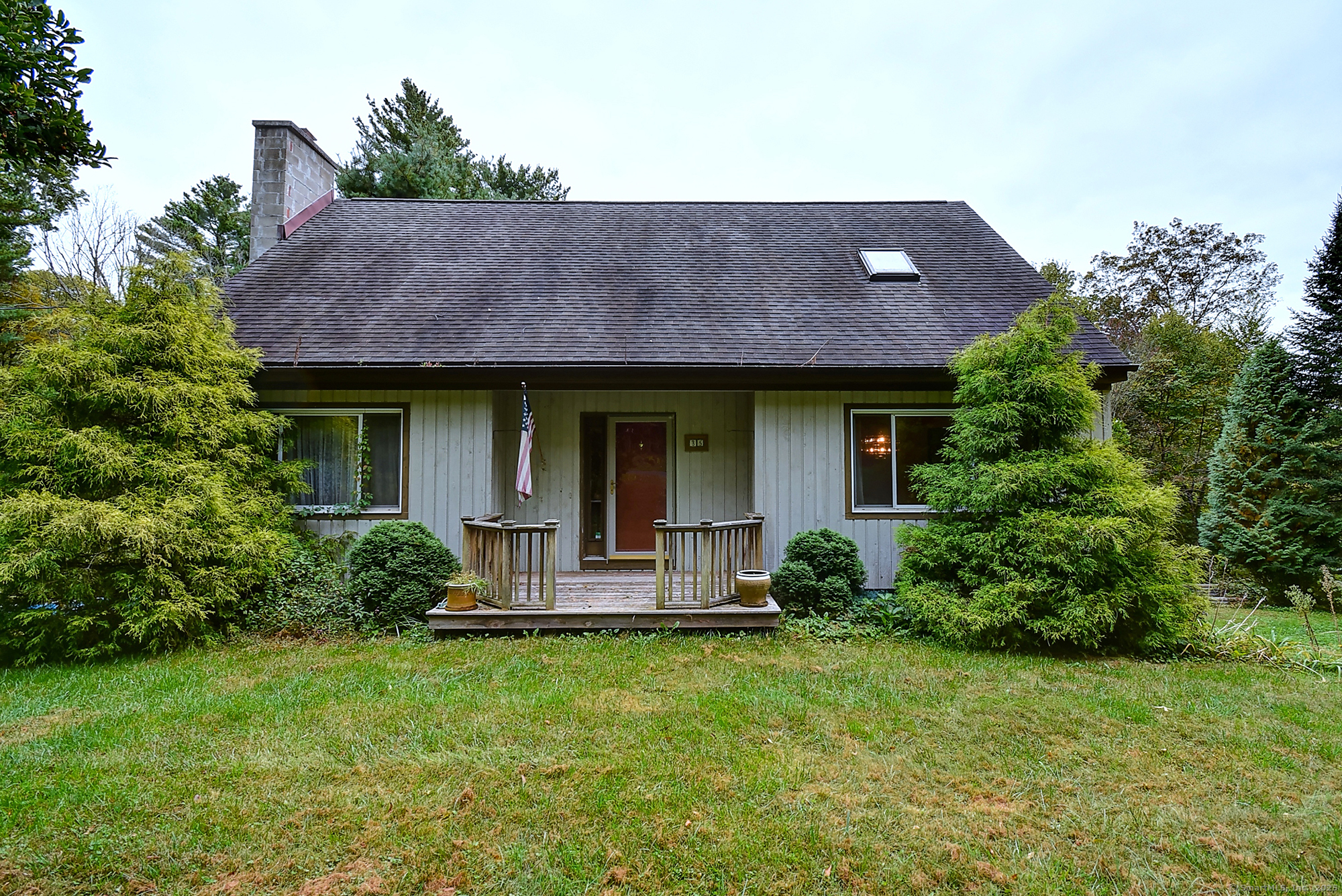 35 Weekeepeemee Road Bethlehem, CT 06751 - Photo 33 of 40 a front view of a house with porch and garden