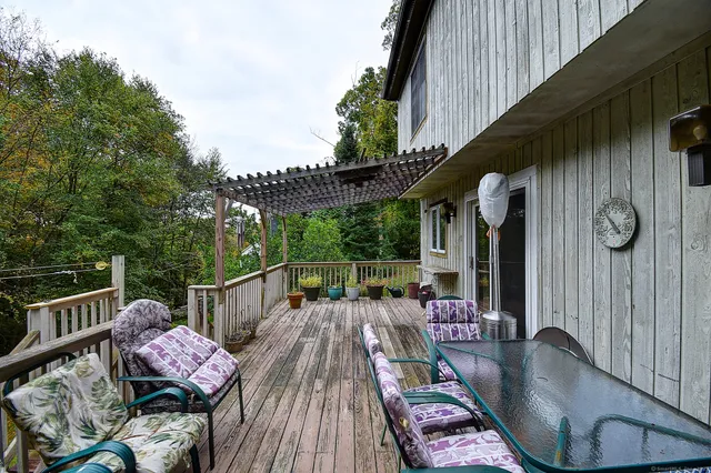 a view of balcony with furniture