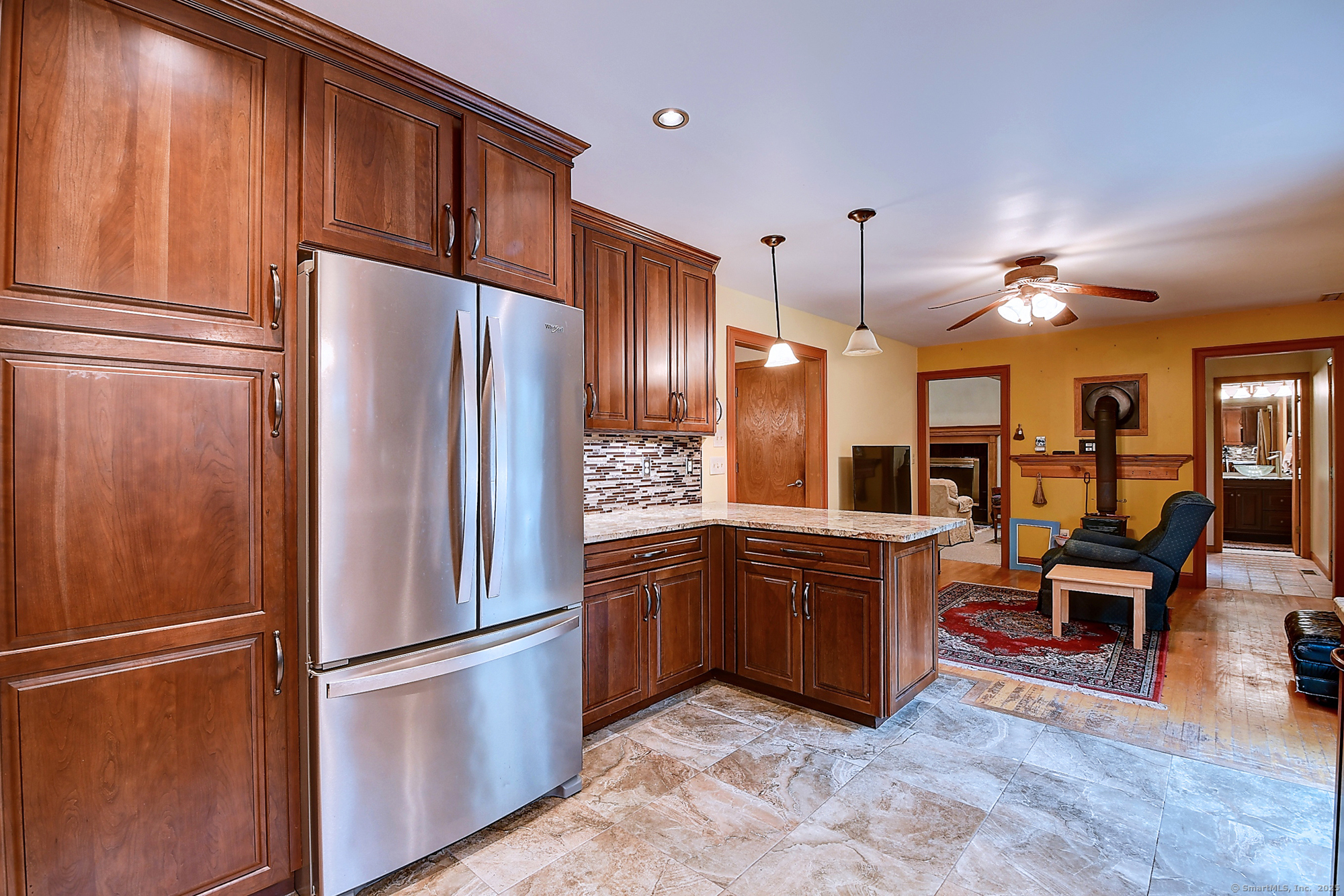 35 Weekeepeemee Road Bethlehem, CT 06751 - Photo 4 of 40 a kitchen with stainless steel appliances granite countertop a refrigerator a stove a sink and dishwasher