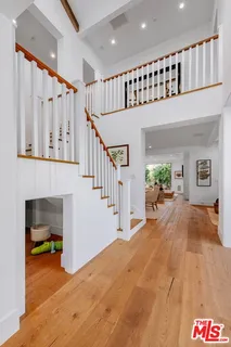 a kitchen with a sink cabinets and window