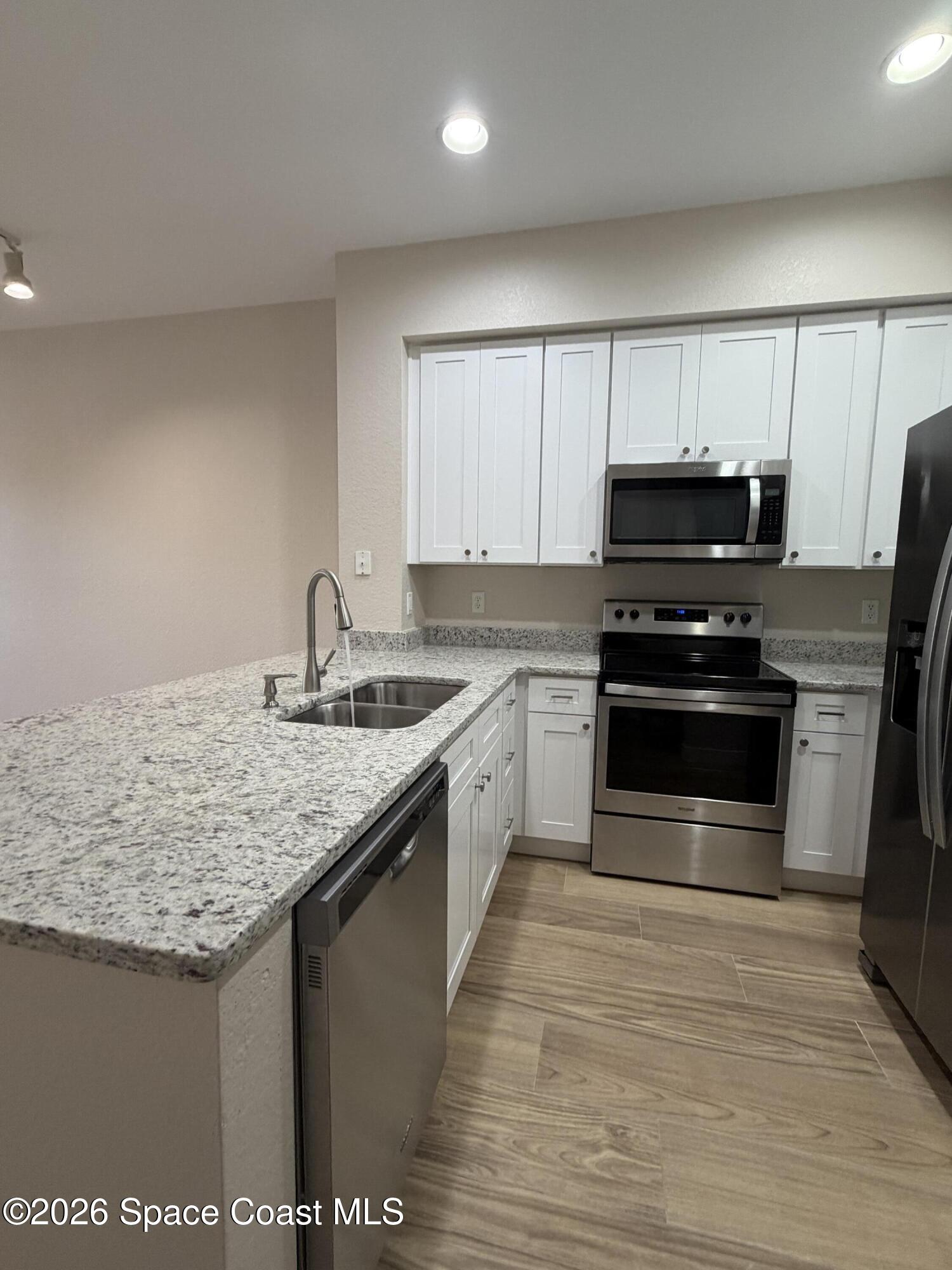 105 Turpial Way, Unit 103 Melbourne, FL 32901 - Photo 6 of 31 IMG_0577