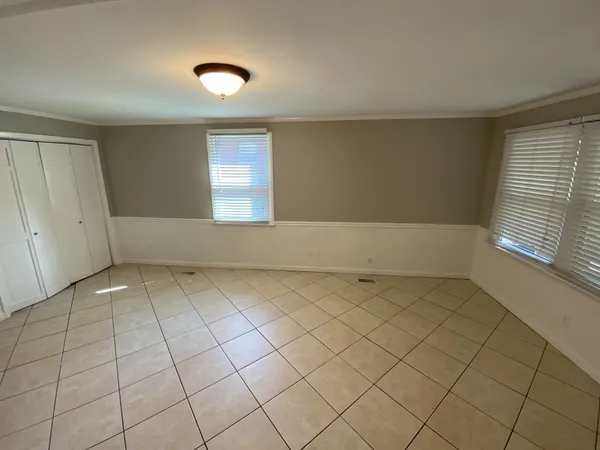 an empty room with windows