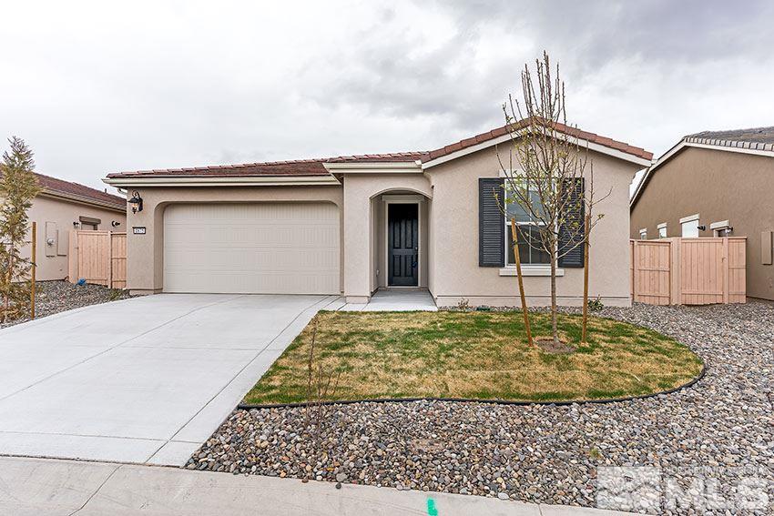 1875 Toltec Trail Reno, NV 89521 - Photo 1 of 1 a view of a house with a yard