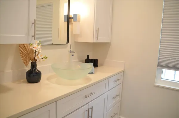 a bathroom with a shower and a toilet