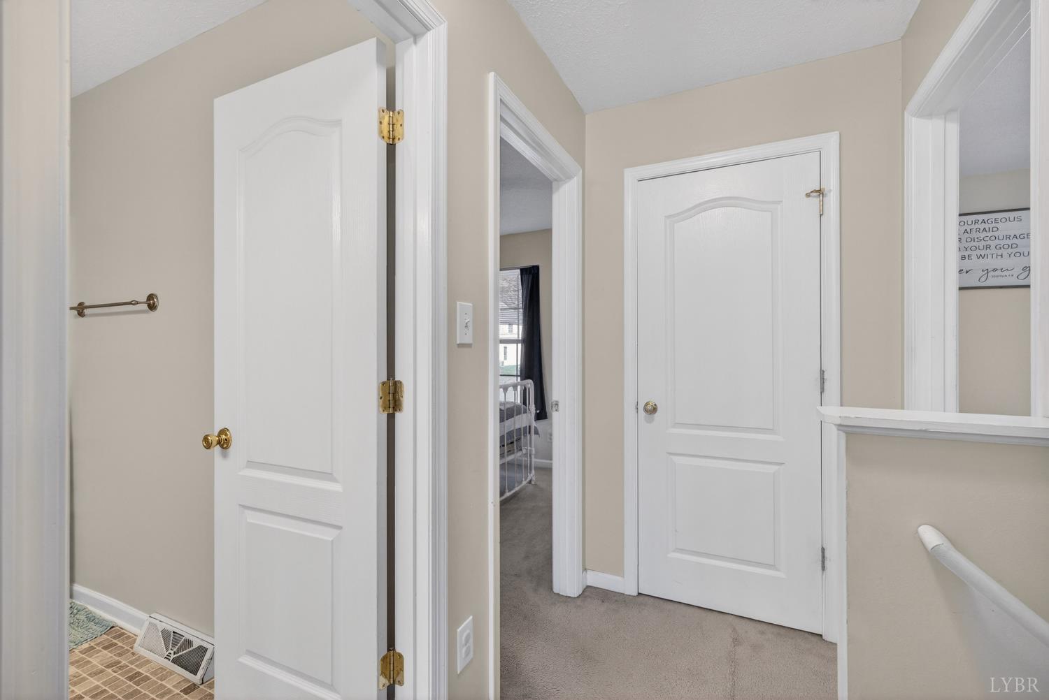 211 Wessex Road Lynchburg, VA 24501 - Photo 22 of 56 a view of a hallway with a wooden door