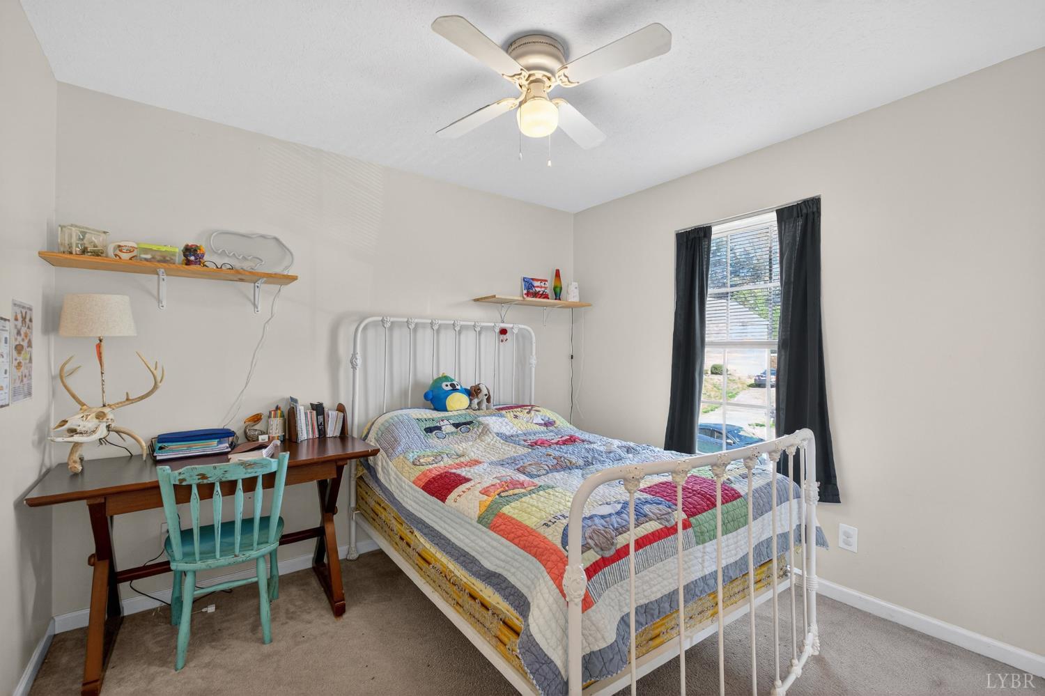 211 Wessex Road Lynchburg, VA 24501 - Photo 24 of 56 a bedroom with a bed and a table in it