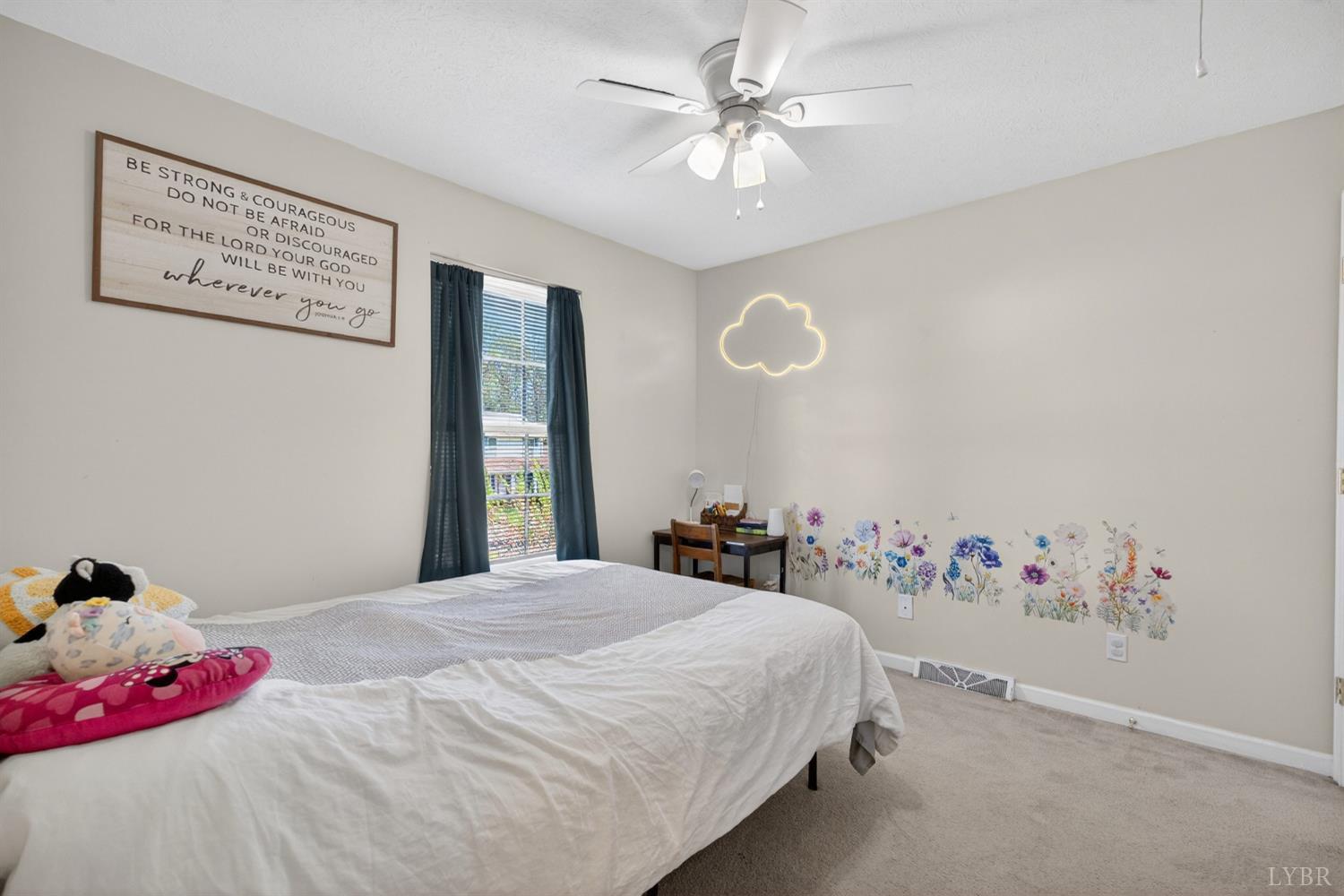 211 Wessex Road Lynchburg, VA 24501 - Photo 26 of 56 a bedroom with a bed and a chandelier