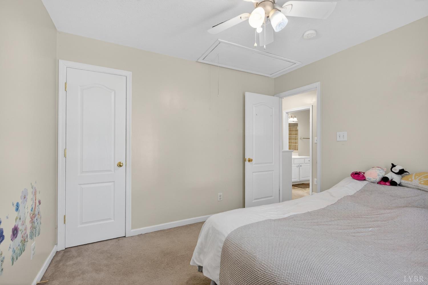 211 Wessex Road Lynchburg, VA 24501 - Photo 27 of 56 a bedroom with a bed and a chandelier