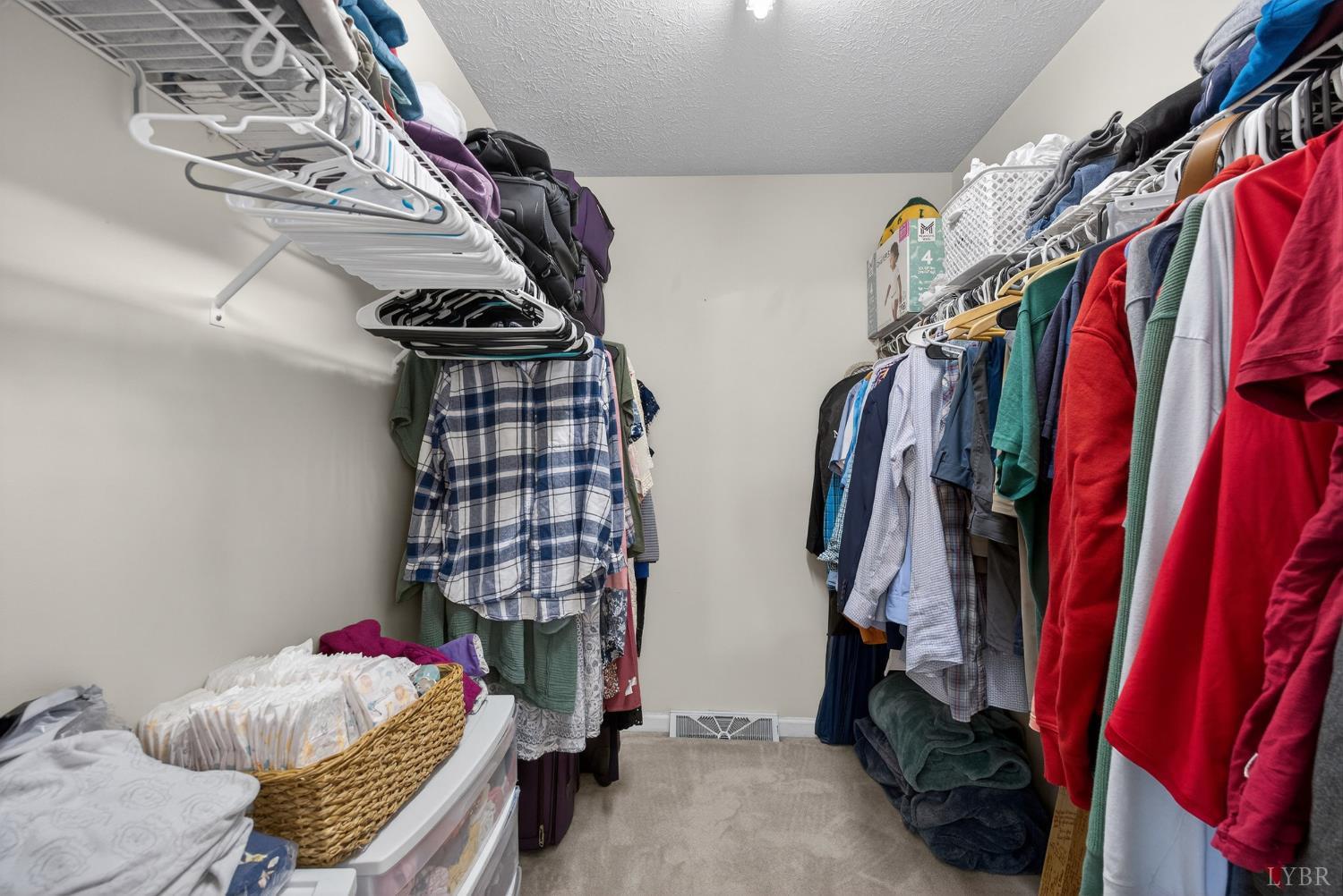 211 Wessex Road Lynchburg, VA 24501 - Photo 31 of 56 a view of walk in closet with clothes and shoes