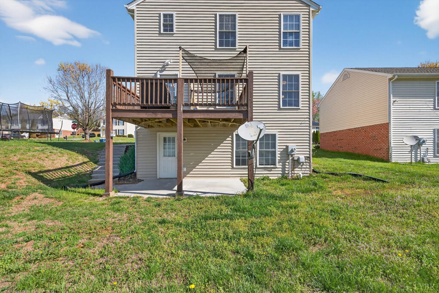 211 Wessex Road Lynchburg, VA 24501 - Photo 48 of 56 a view of a house with a yard and sitting area