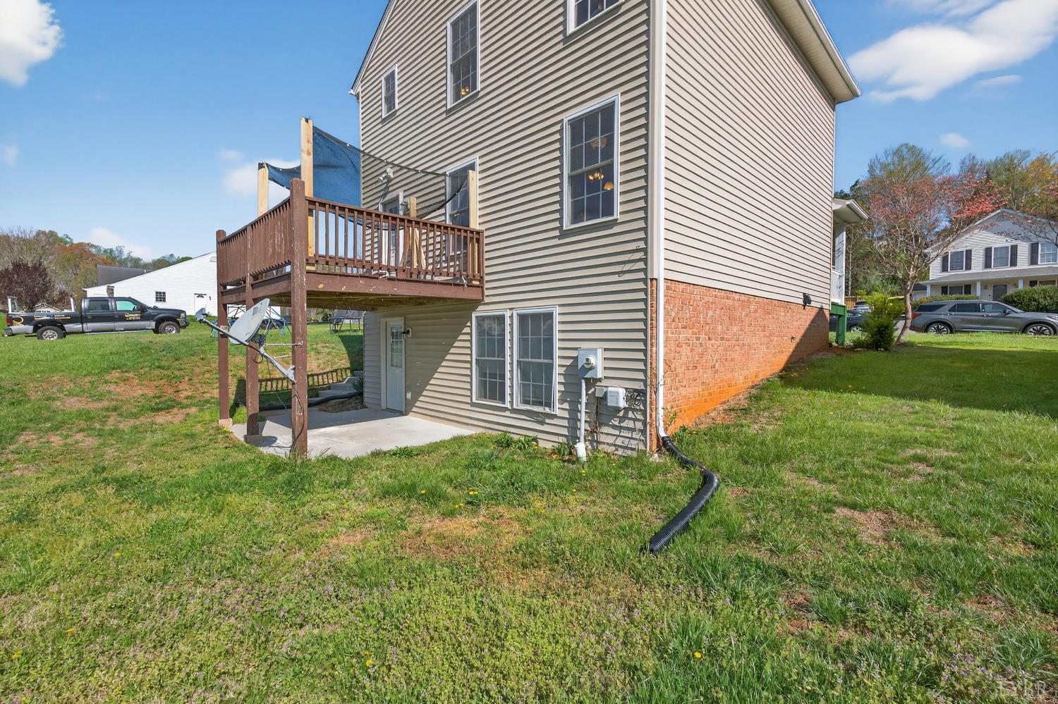 211 Wessex Road Lynchburg, VA 24501 - Photo 49 of 56 a view of a house with a yard and sitting area
