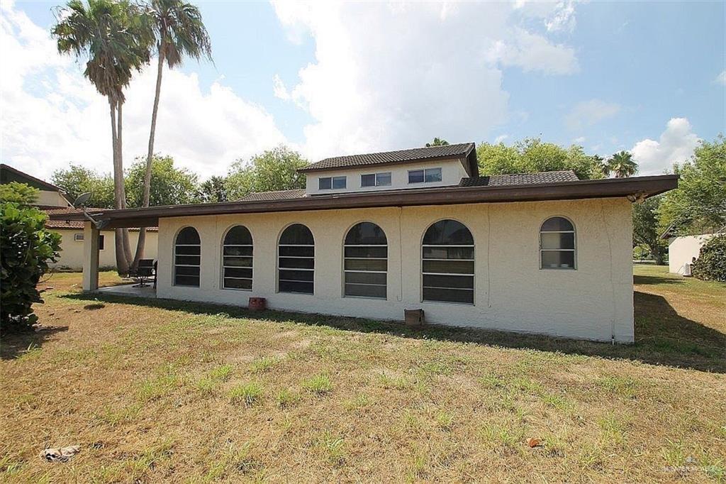 110 Avenida Morelos Rancho Viejo, TX 78575 - Photo 17 of 19 a view of a house with a yard