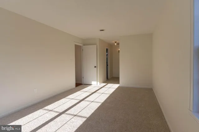 a view of a room with an empty space