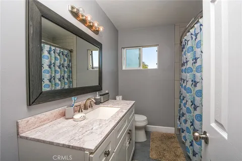 a bedroom with a bed and a closet