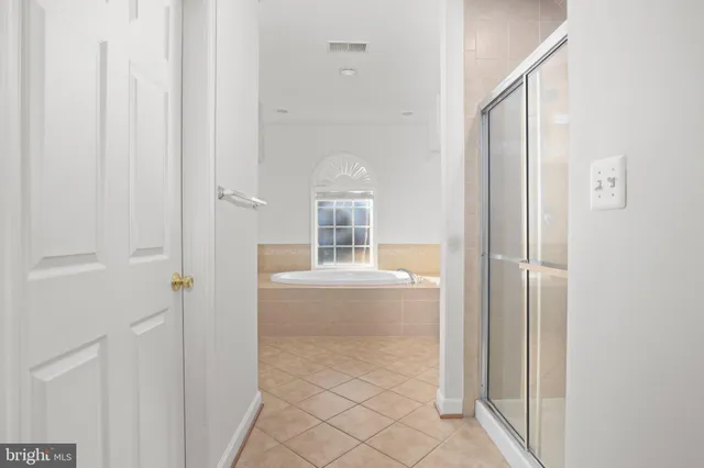 a picture of a bathroom with a shower