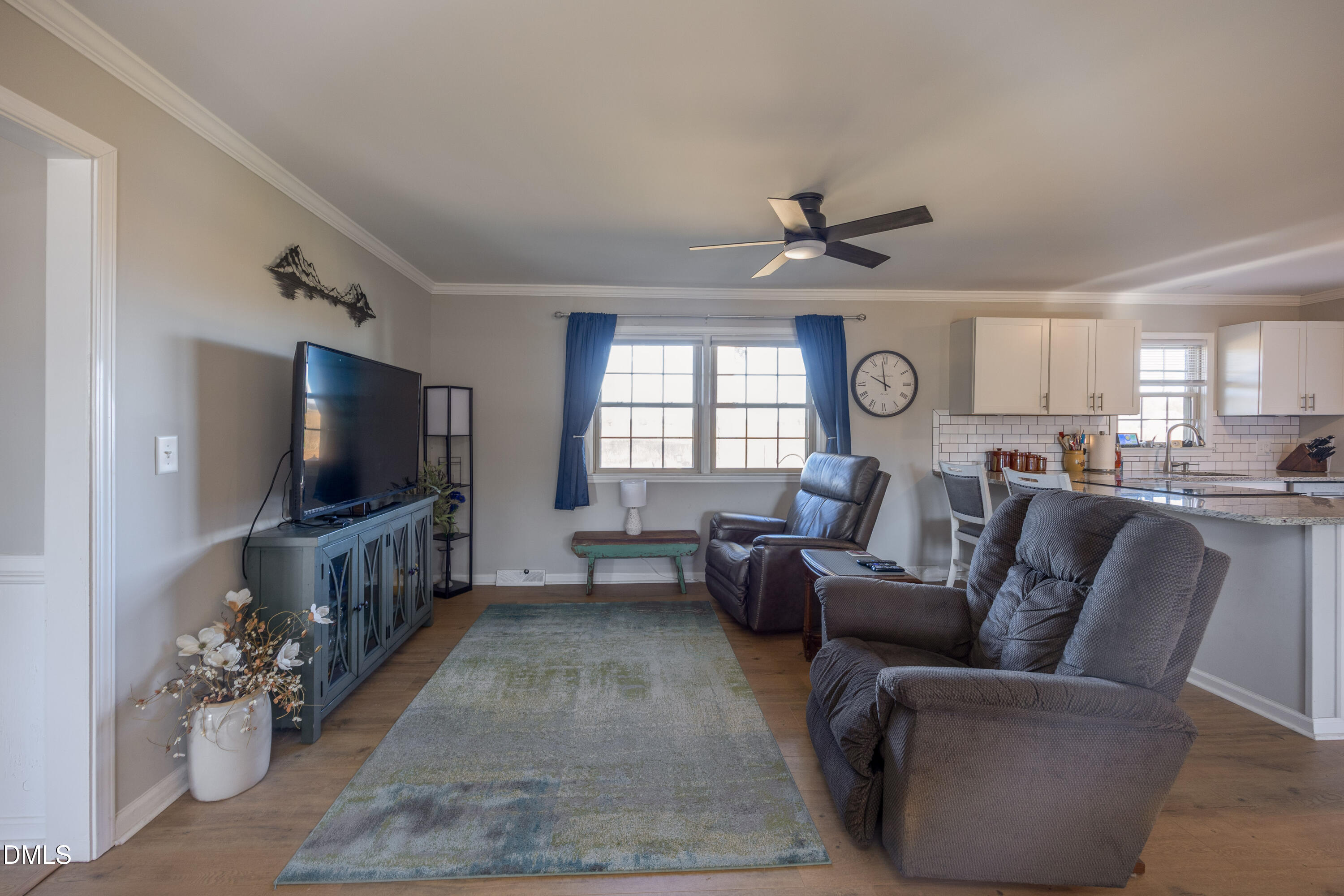760 Eugene Jernigan Road Dunn, NC 28334 - Photo 14 of 30 a living room with furniture and a flat screen tv