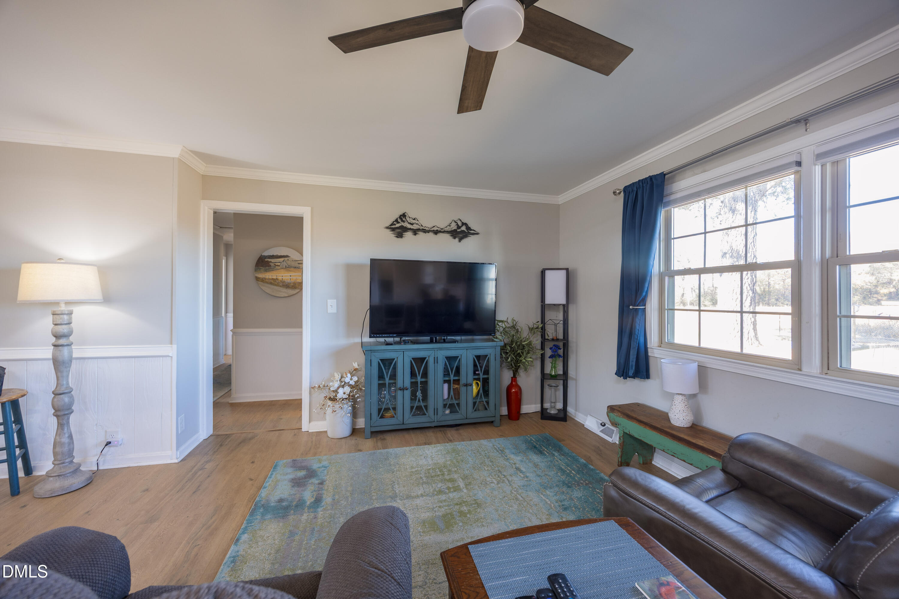 760 Eugene Jernigan Road Dunn, NC 28334 - Photo 15 of 30 a living room with furniture and a flat screen tv