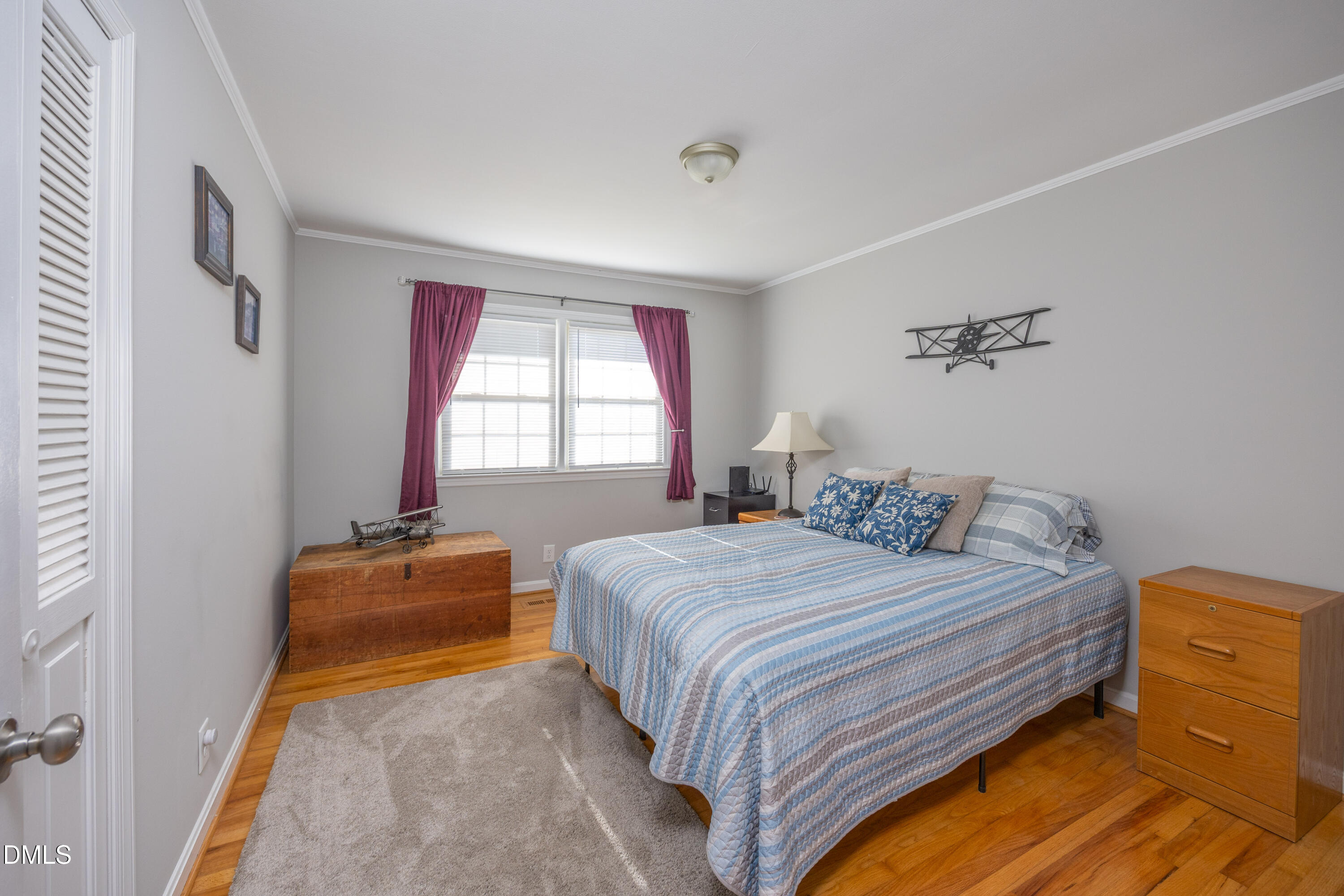 760 Eugene Jernigan Road Dunn, NC 28334 - Photo 17 of 30 a bedroom with bed and window