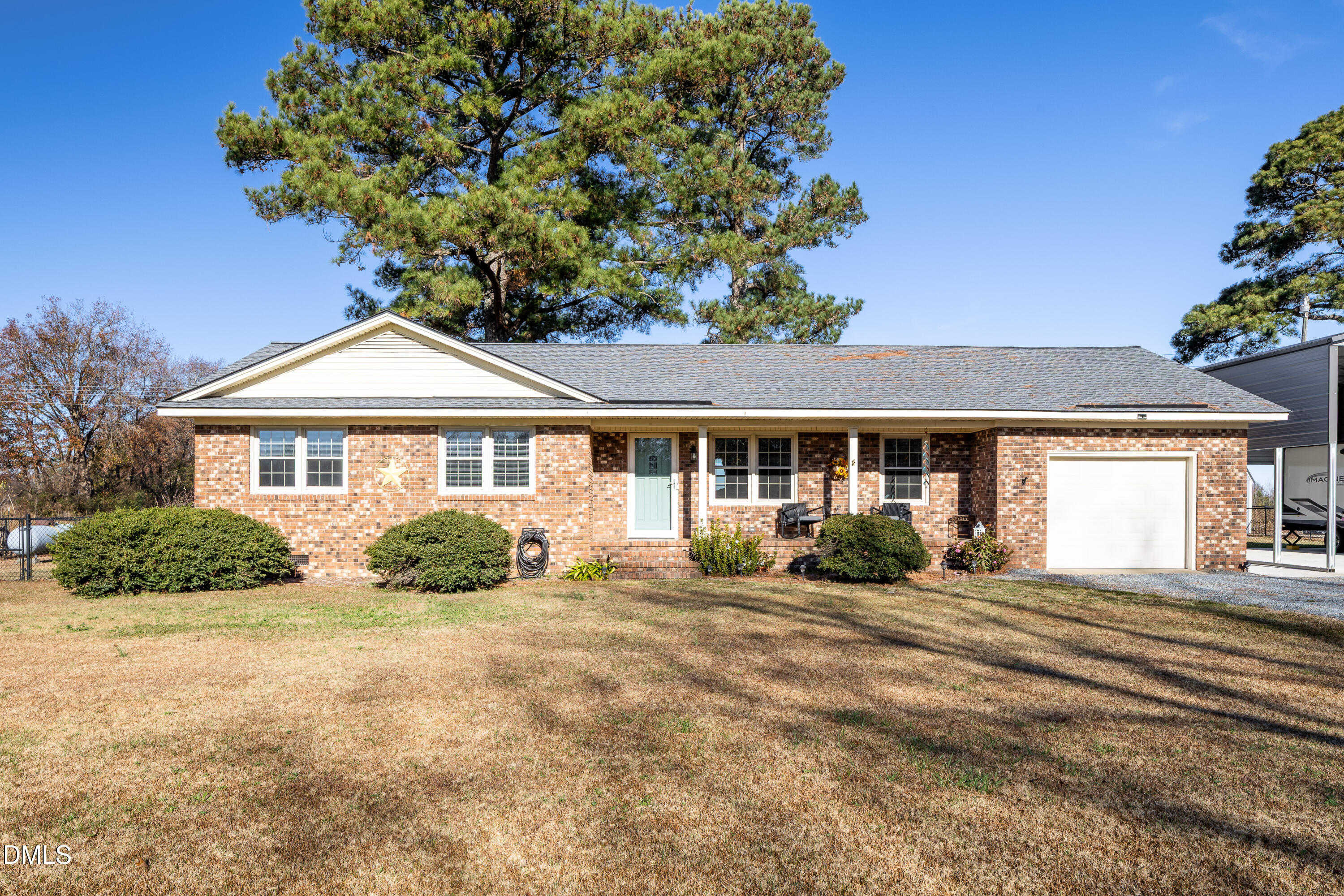 760 Eugene Jernigan Road Dunn, NC 28334 - Photo 2 of 30 a front view of a house with garden