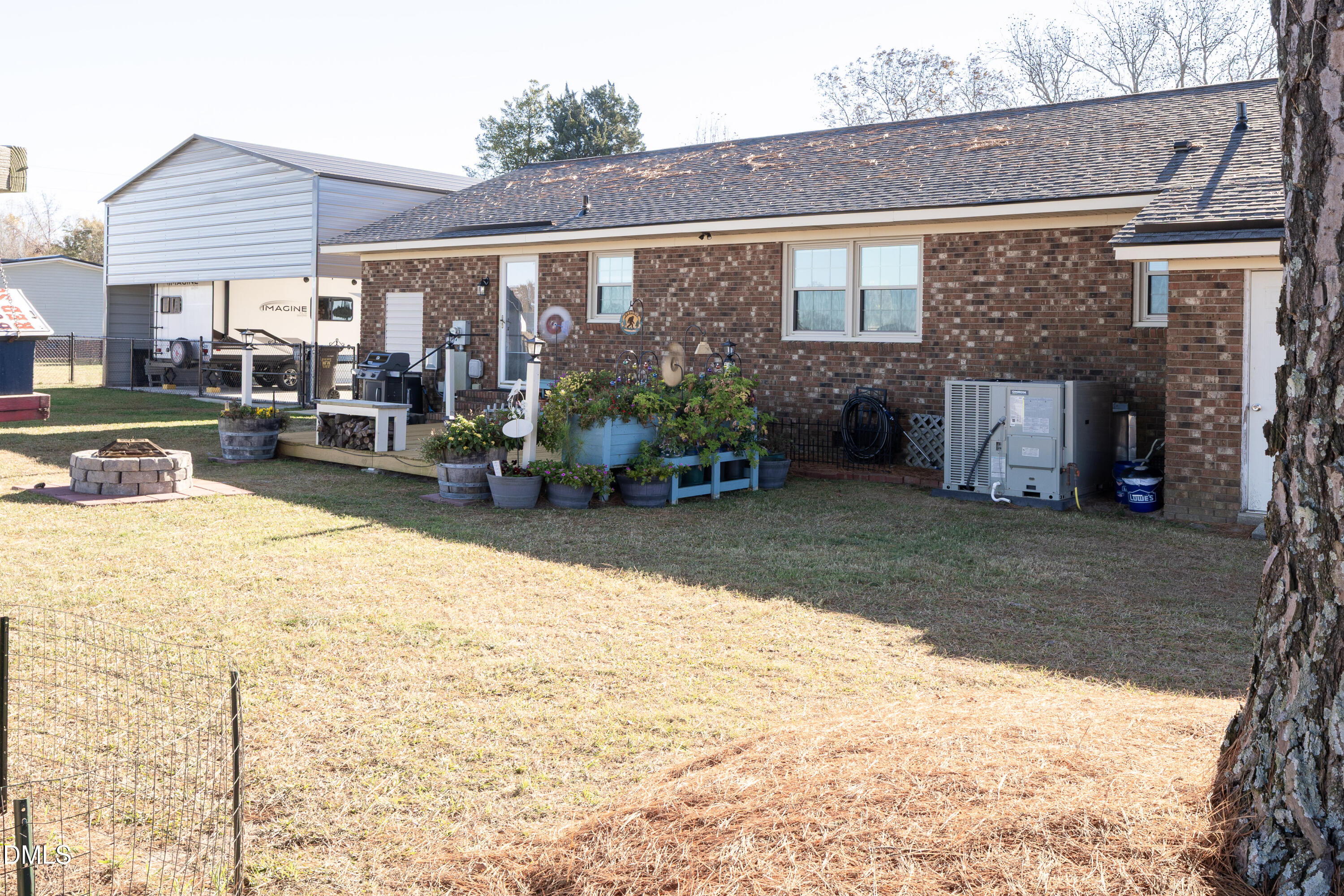 760 Eugene Jernigan Road Dunn, NC 28334 - Photo 26 of 30 a view of a house with a patio