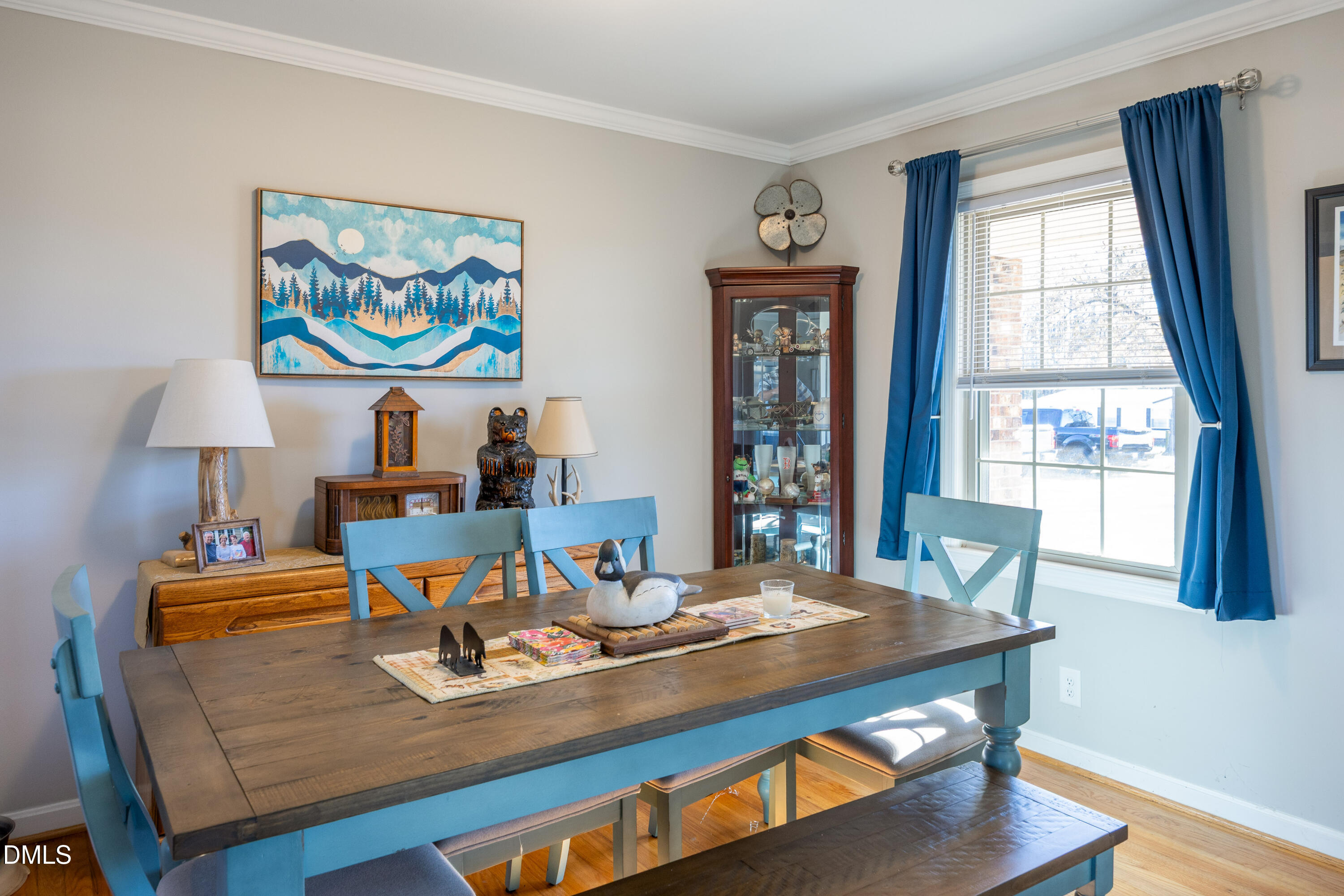 760 Eugene Jernigan Road Dunn, NC 28334 - Photo 6 of 30 a view of a dining room with furniture a rug and wooden floor
